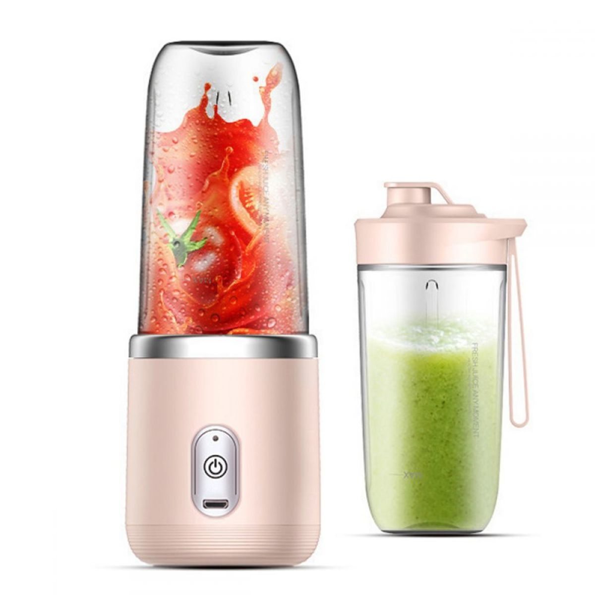 Rosa Mixer und ein klares Glas mit grünem Smoothie. Rote Tomate im Mixer.
