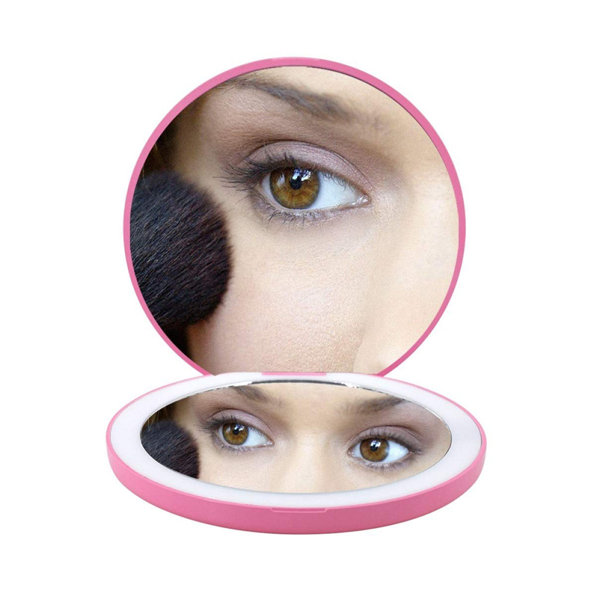 Das Auge einer Frau in einem Spiegel. Der Spiegel ist rosa und rund und hat ein Licht um sich herum.