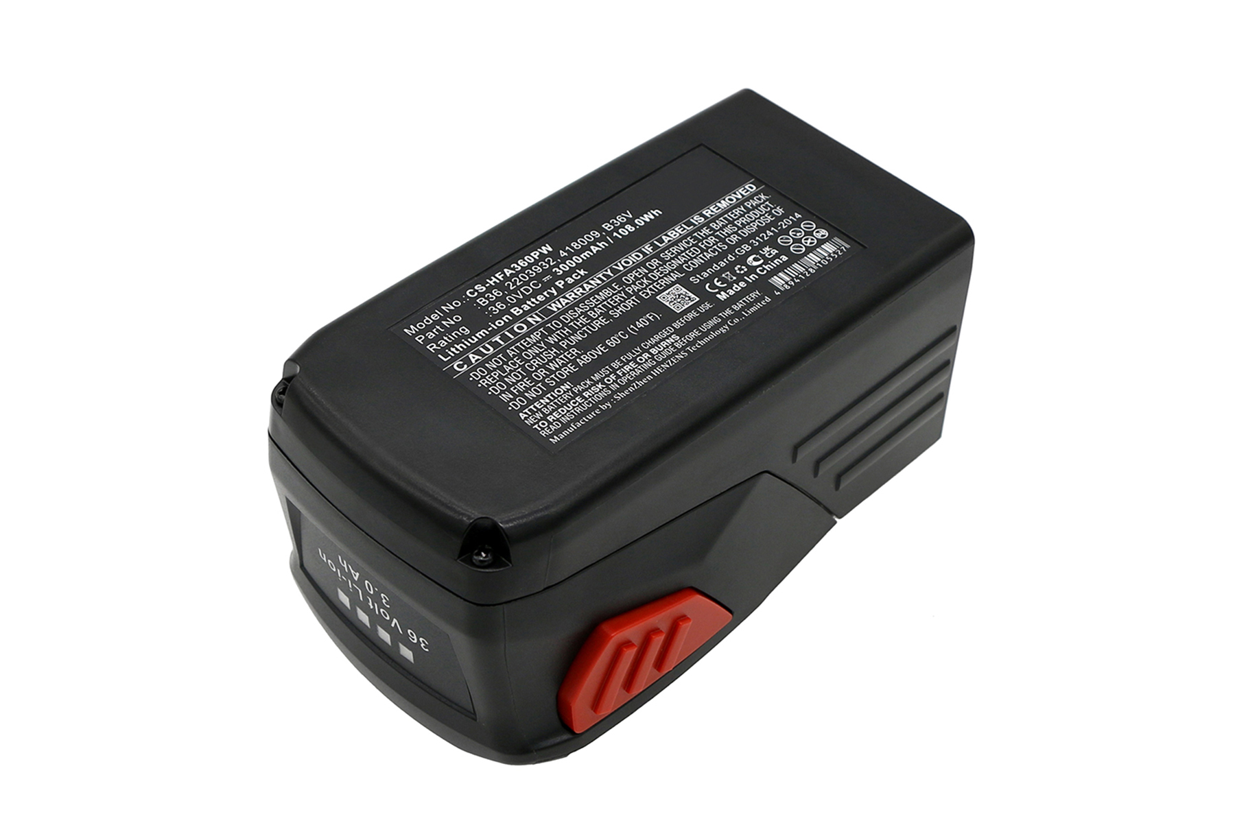 Una batteria nera con un pulsante rosso ed etichette su una superficie bianca.