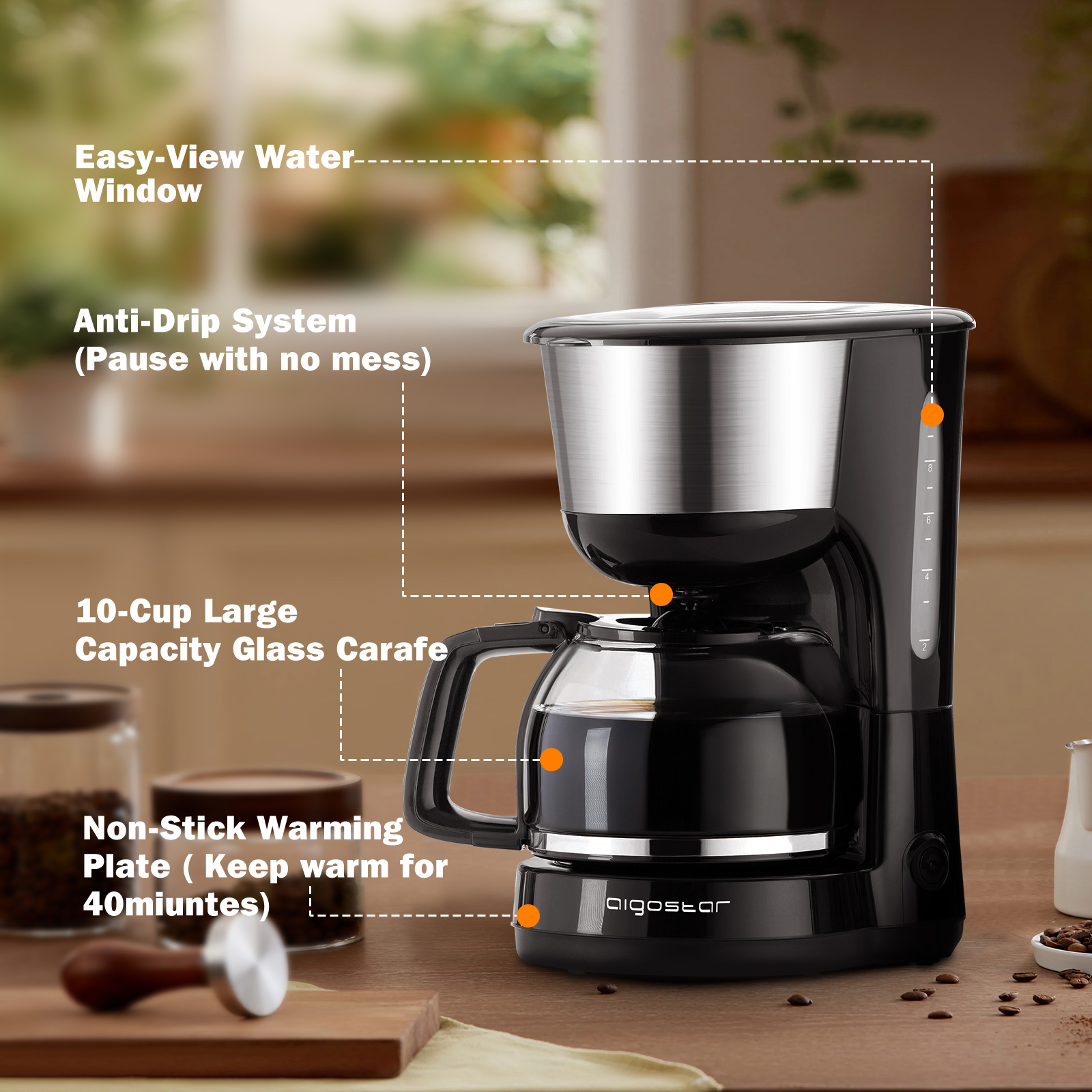 Cafetera negra con anotaciones: ventana de agua, antigoteo, jarra de 10 tazas, placa calentadora. Se muestran granos de café.