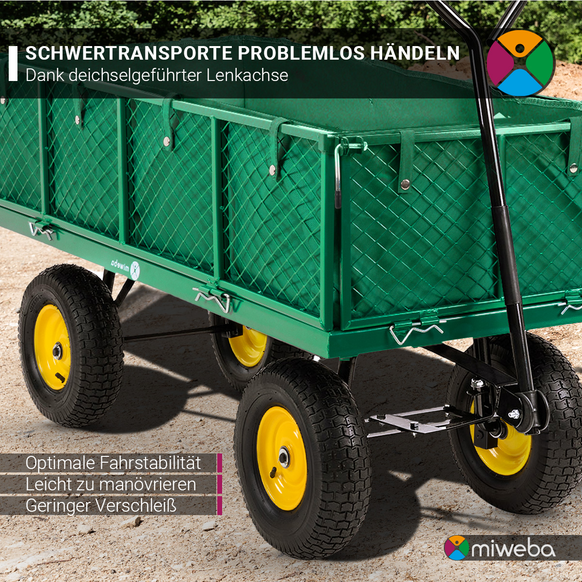 Grüner Wagen mit gelben Rädern auf Kies, Text: Schwerlasttransport.
