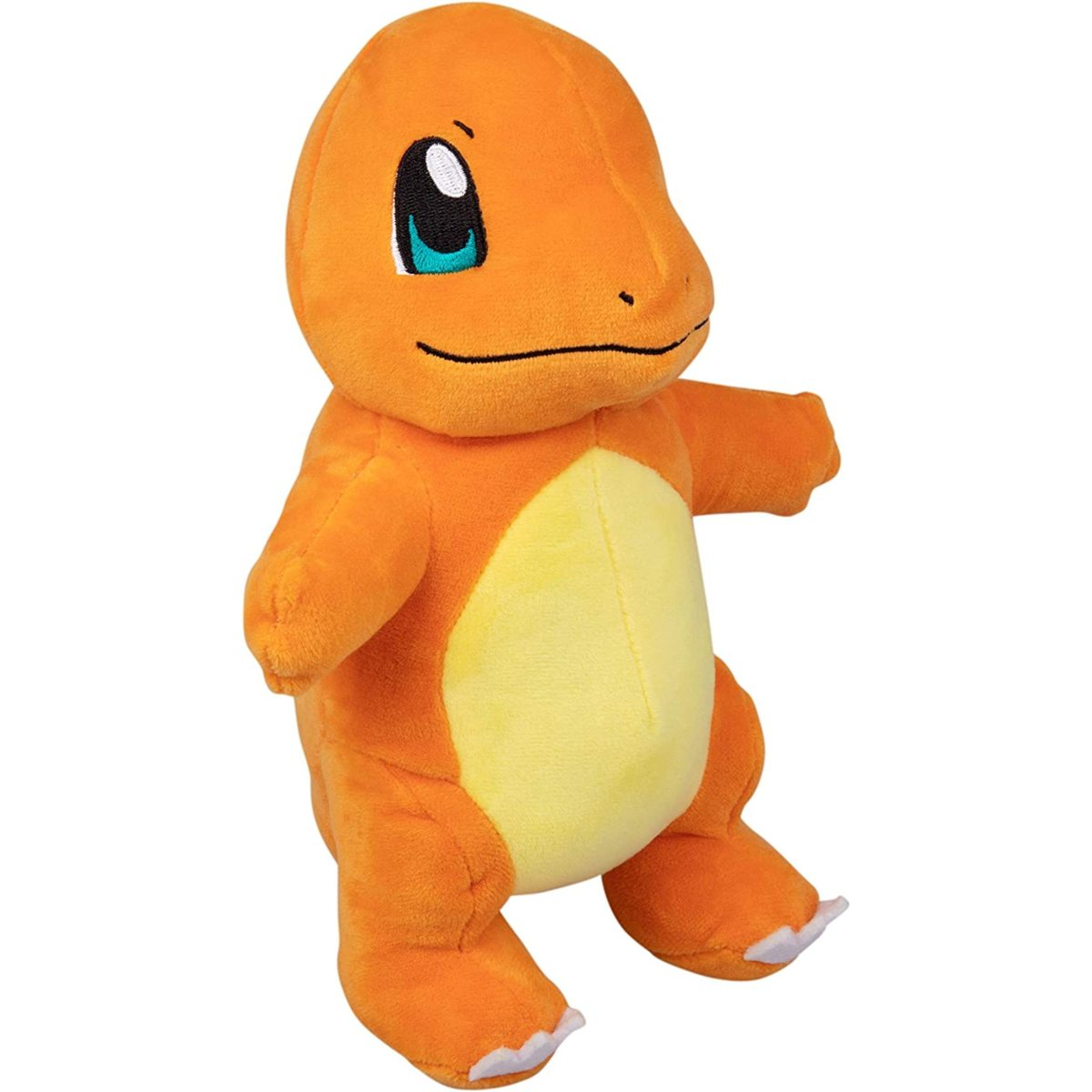 Charmander-Plüschtier. Orange mit gelbem Bauch, schwarzen Augen und einem fröhlichen Gesicht.