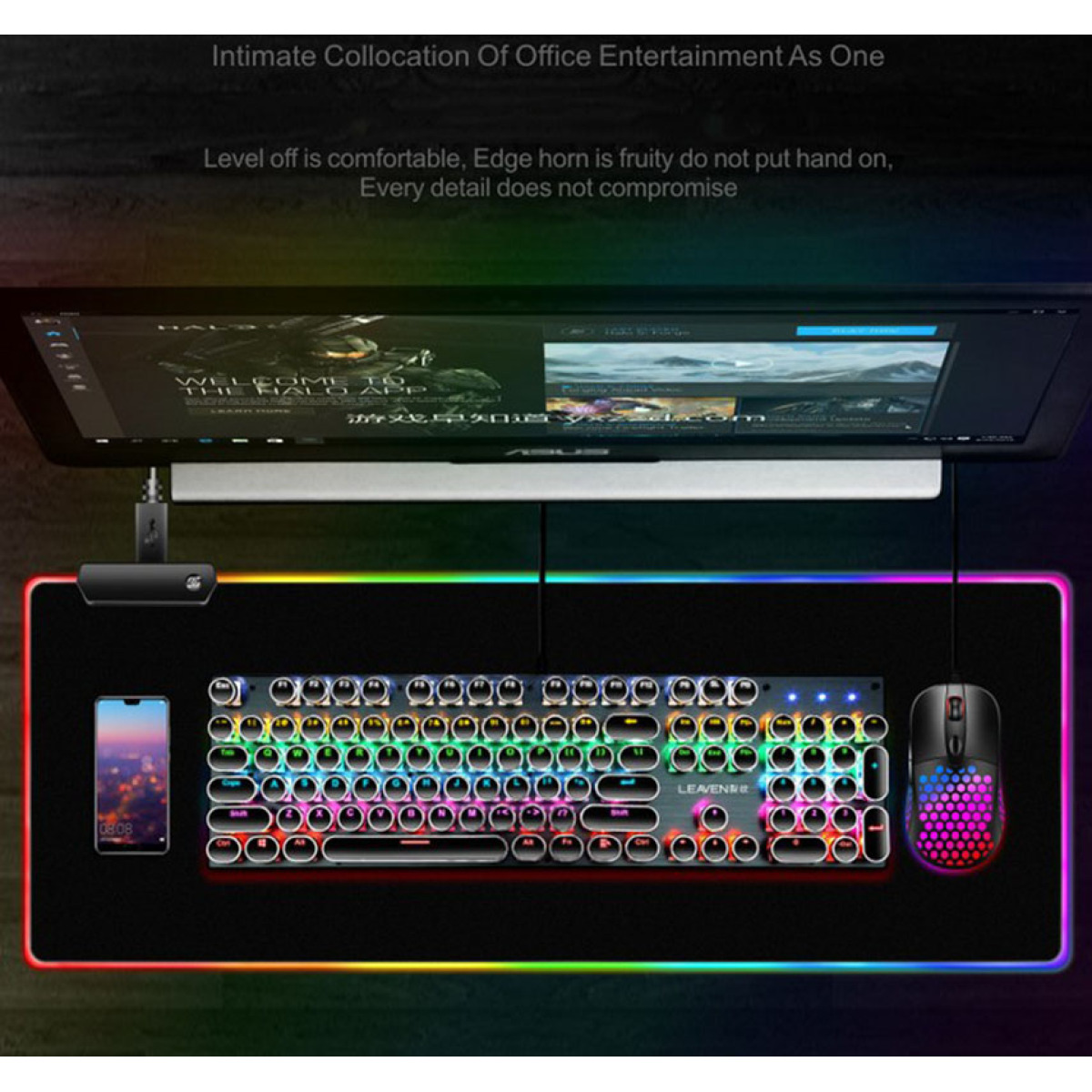 Ein Gaming-Setup mit Tastatur, Maus und Monitor mit RGB-Beleuchtung.