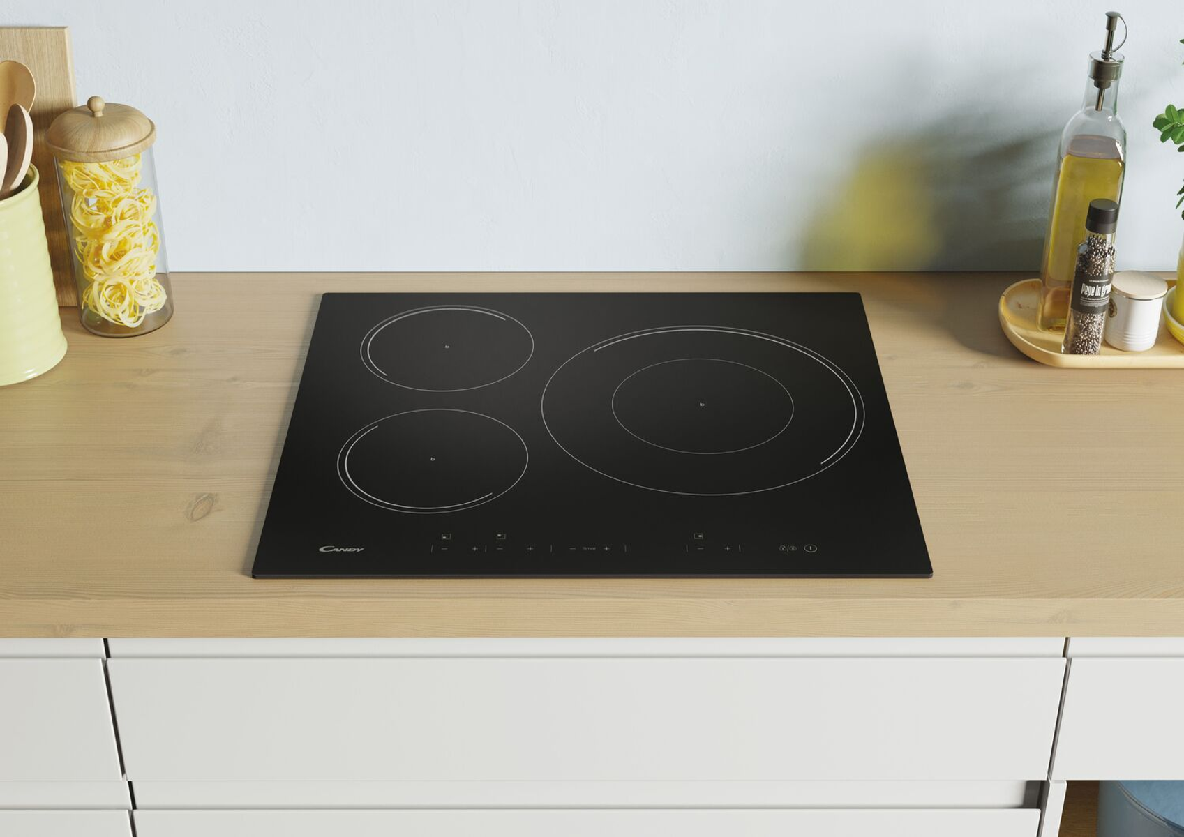 Czarna płyta elektryczna z trzema okrągłymi elementami grzejnymi na drewnianej powierzchni.