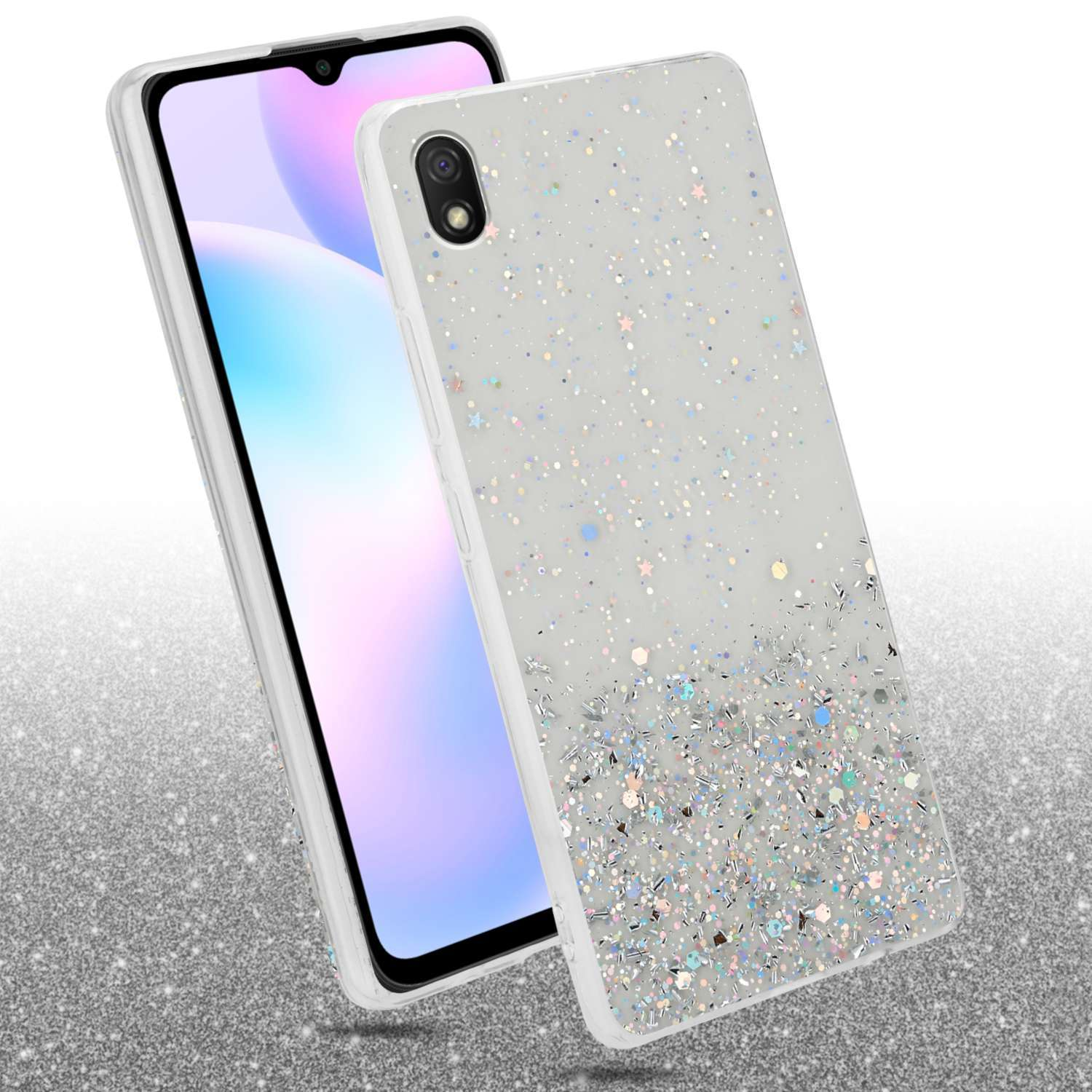 Telefono in una custodia glitterata, con un telefono accanto. Lo sfondo è una superficie lucida.