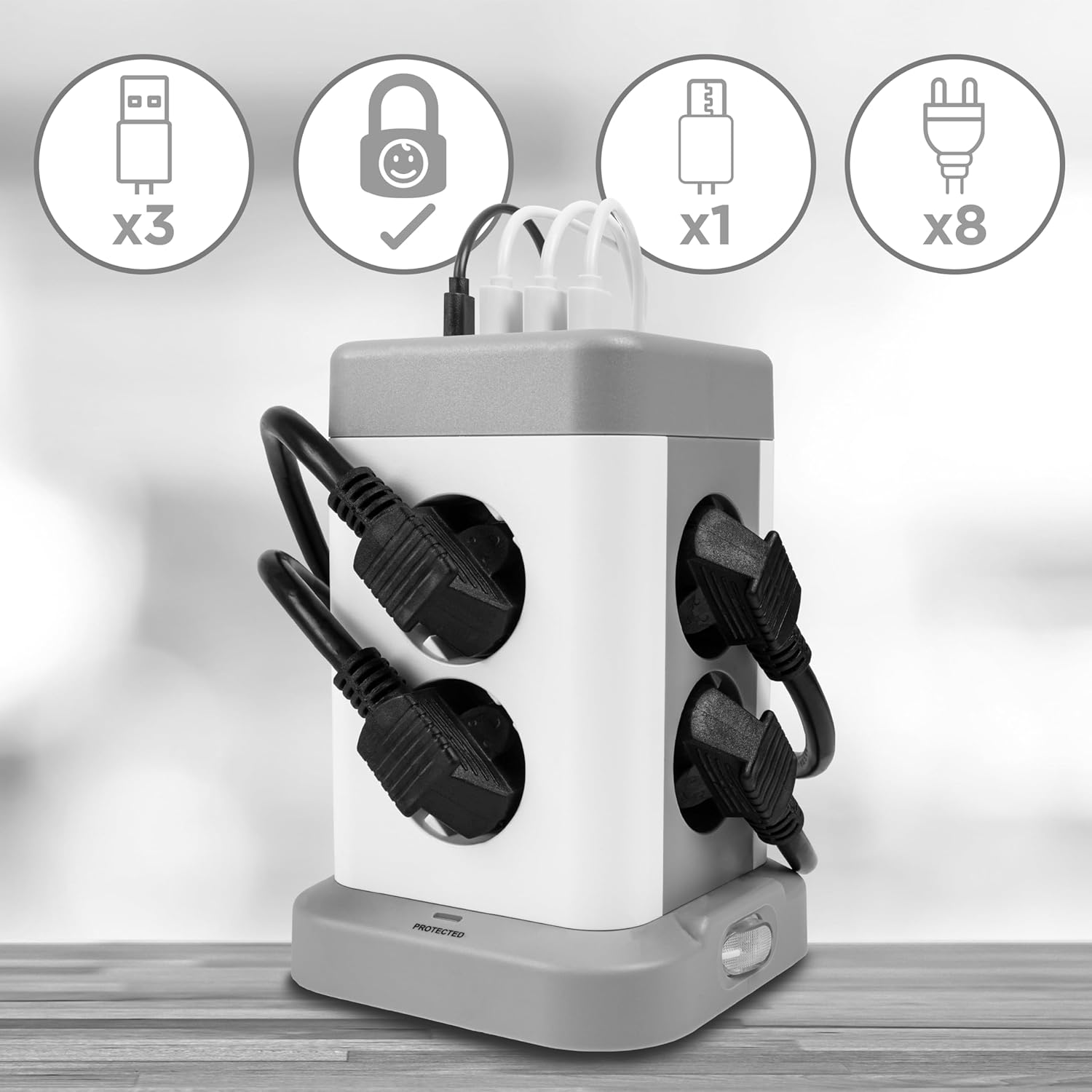 Regleta con USB y enchufes. Es un dispositivo gris y blanco.