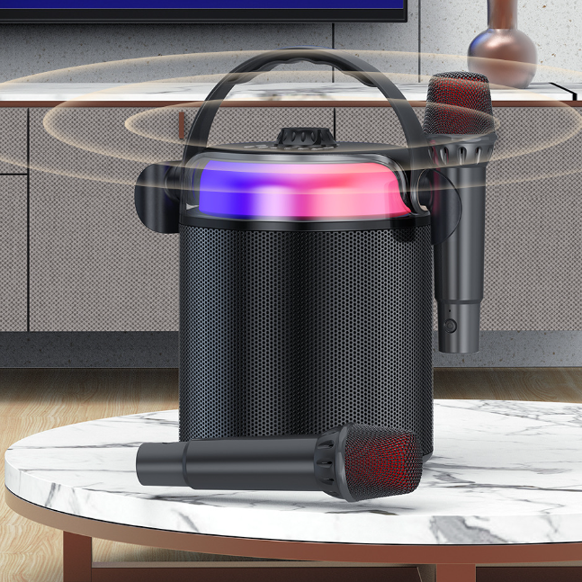 Schwarzer Lautsprecher mit zwei Mikrofonen und leuchtenden Lichtern auf einem Tisch.