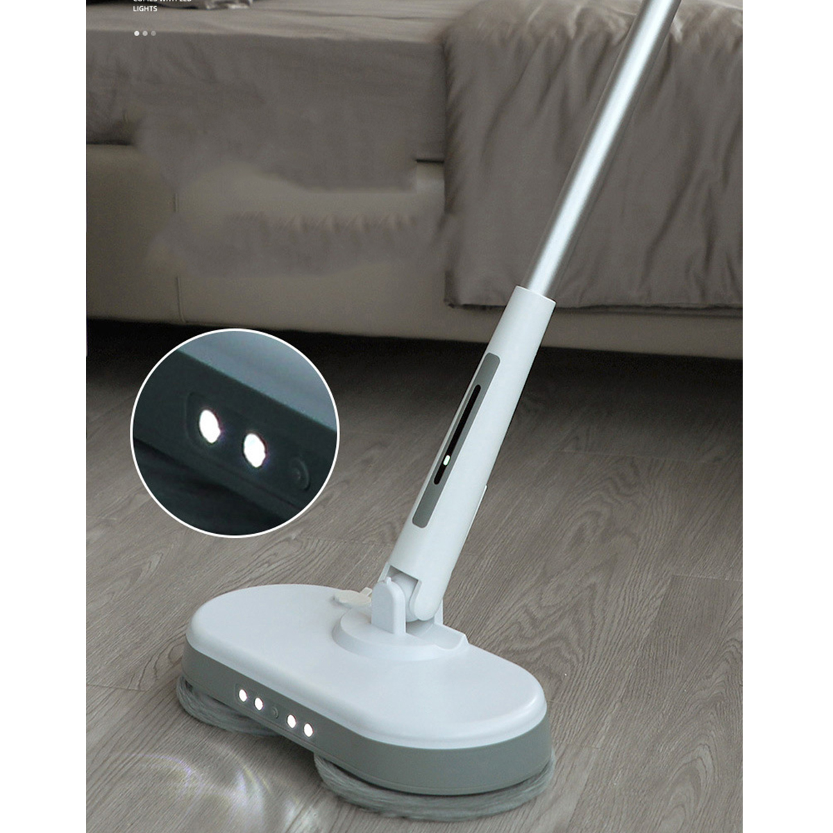 Elektrischer Wischmopp in Weiß und Grau mit Lichtern auf Holzboden.