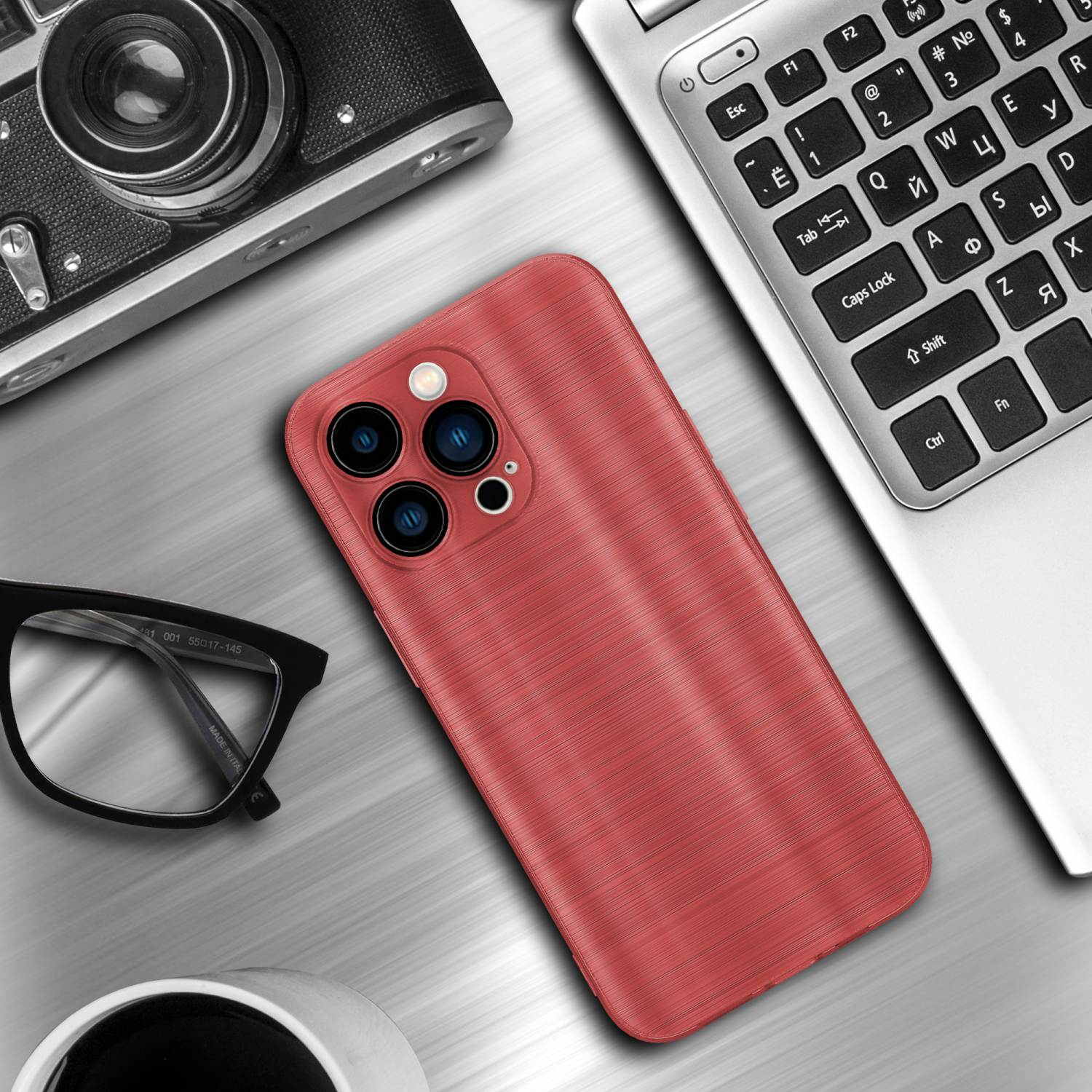 Rote Handyhülle auf einem Schreibtisch mit Brille, Laptop und Kaffeetasse. Hintergrund ist ein Schreibtisch.