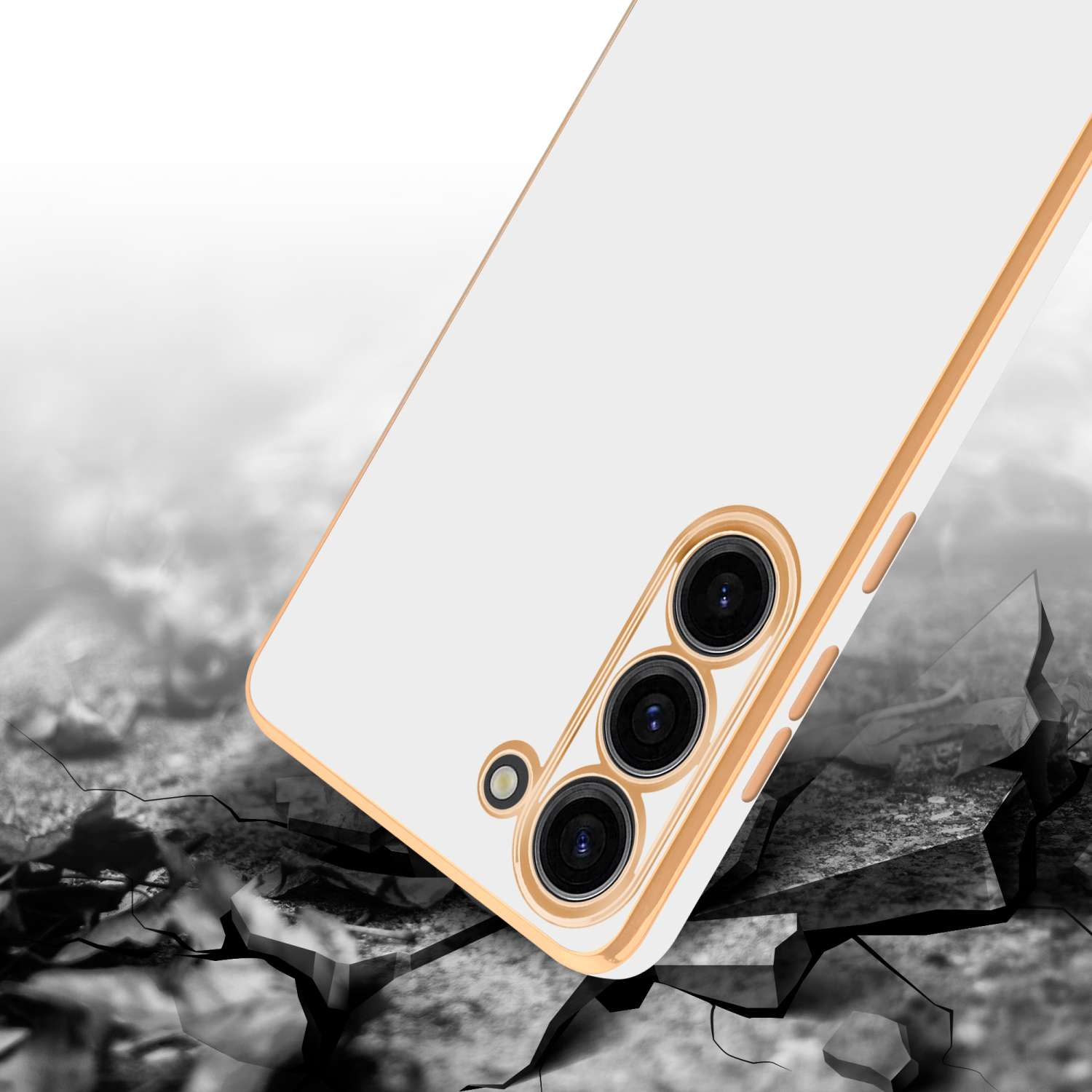 Una custodia per telefono bianca con cornice dorata. Il telefono è angolato e sembra essere su una superficie incrinata.