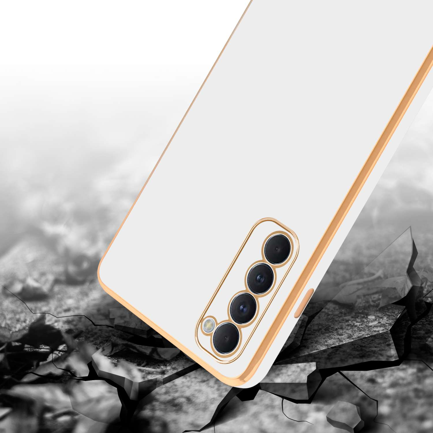 Custodia per telefono bianca con finiture dorate su una superficie incrinata. La custodia è inclinata verso la fotocamera.