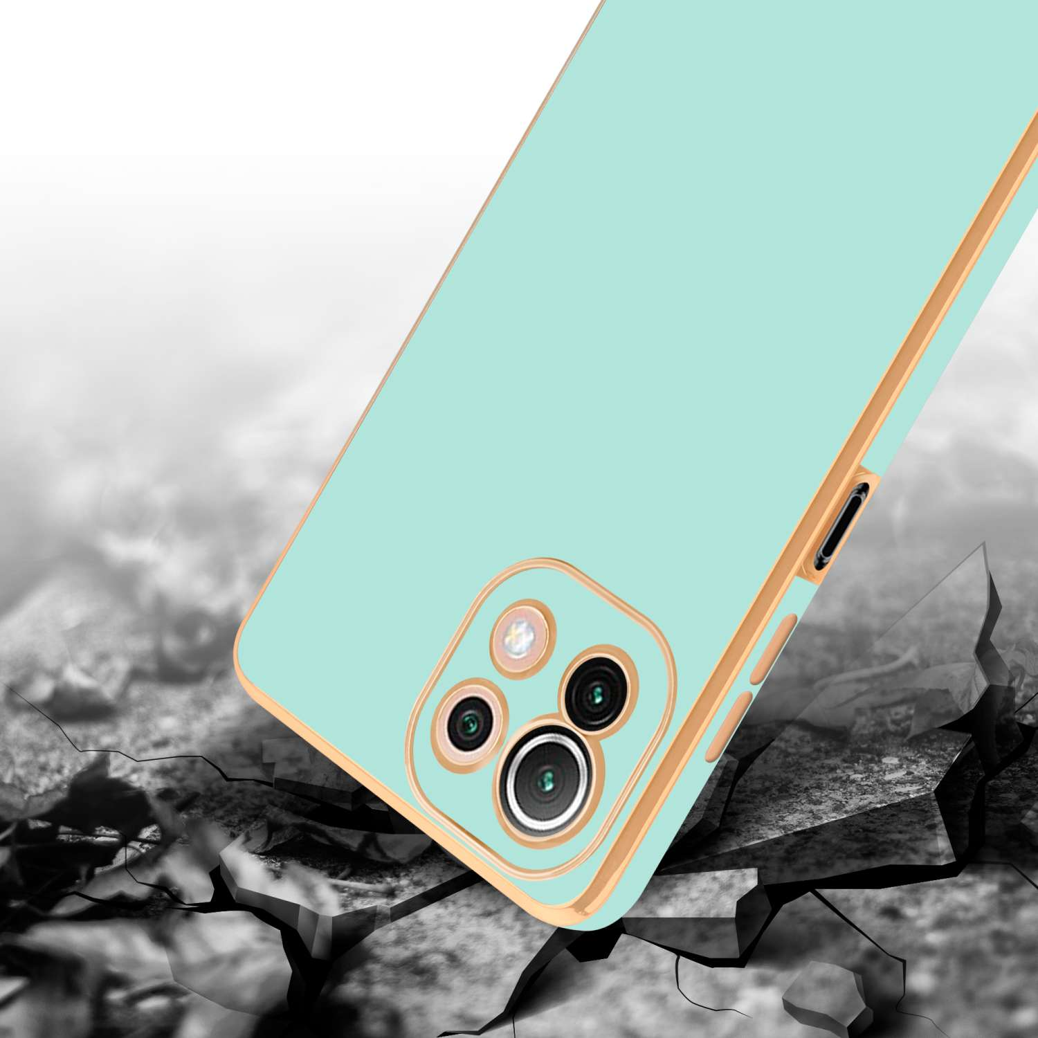 Custodia per telefono su una superficie incrinata, che mostra la fotocamera e una cornice dorata.