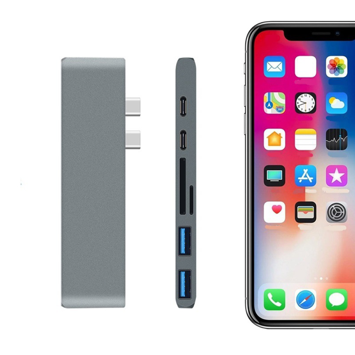 Ein grauer Hub mit mehreren Anschlüssen befindet sich neben einem Telefon. Das Telefon zeigt einen App-Bildschirm.