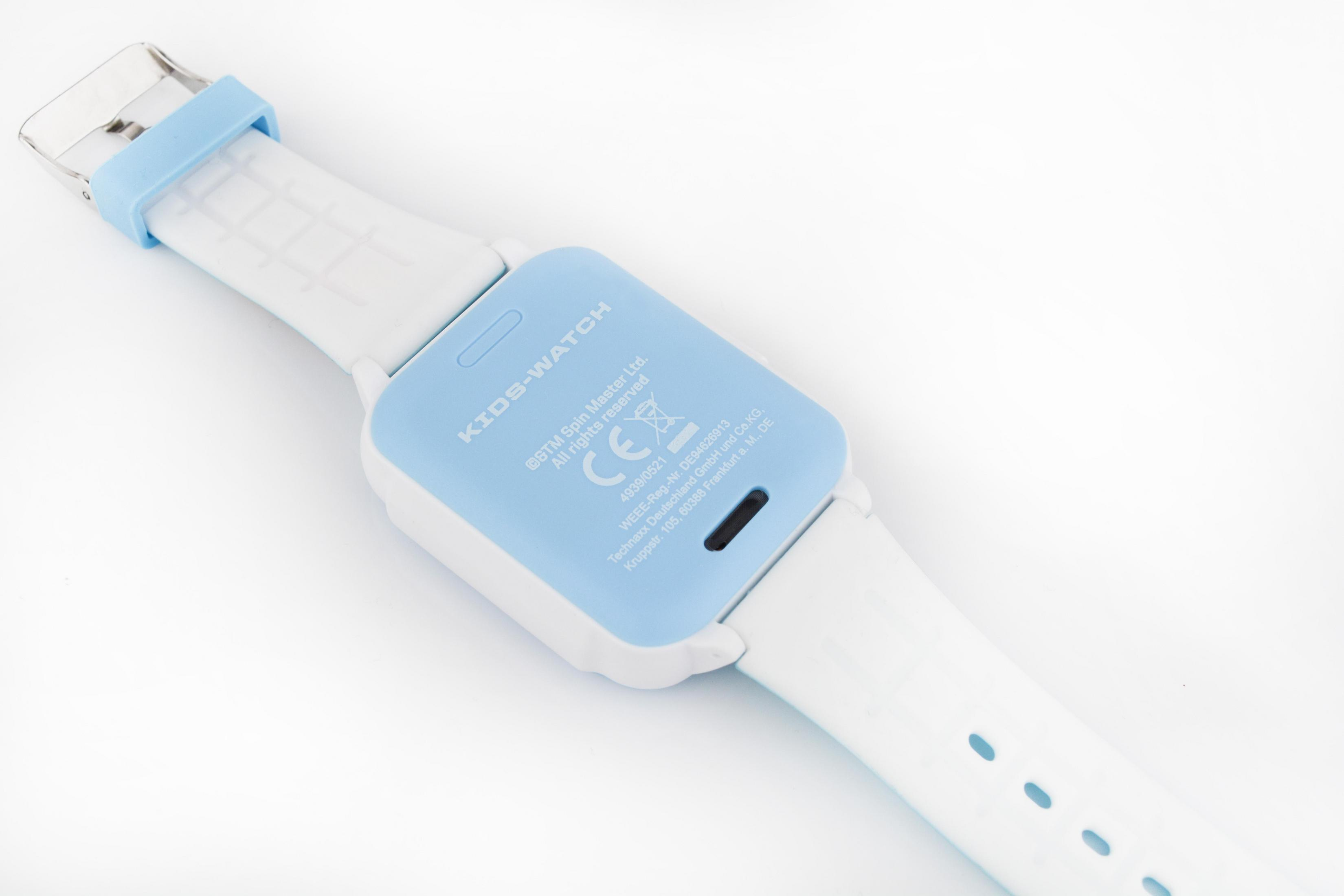 Un orologio per bambini con cinturino azzurro e cinturino bianco, quadrante capovolto.