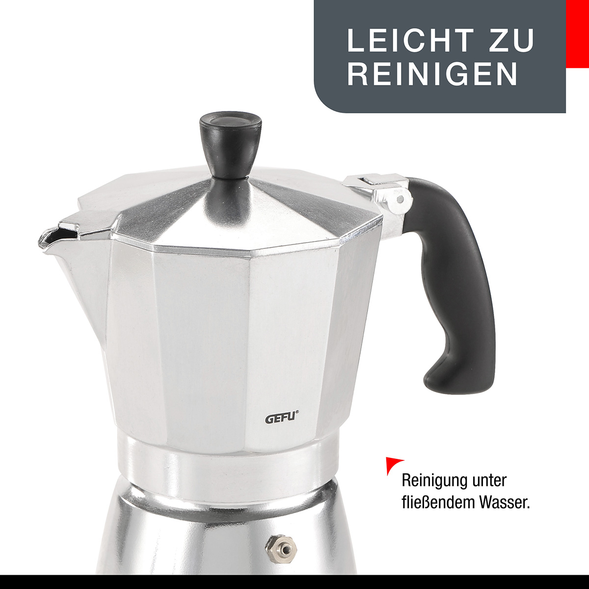 Silberfarbene Kaffeemaschine, schwarzer Griff, mit Text 'LEICHT ZU REINIGEN' und Anweisungen. Weißer Hintergrund.