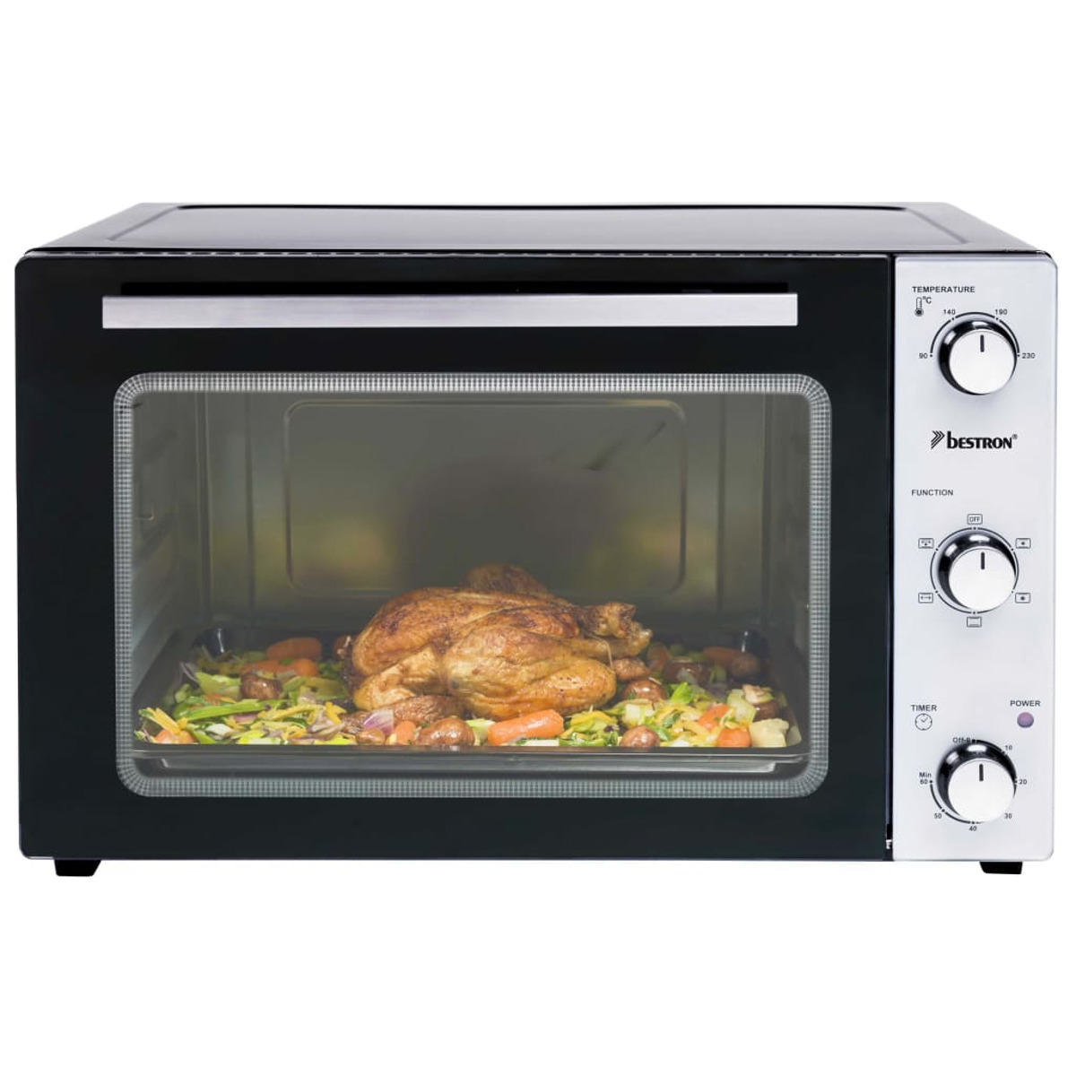 Horno negro con pollo asado y verduras dentro, controles a la derecha.
