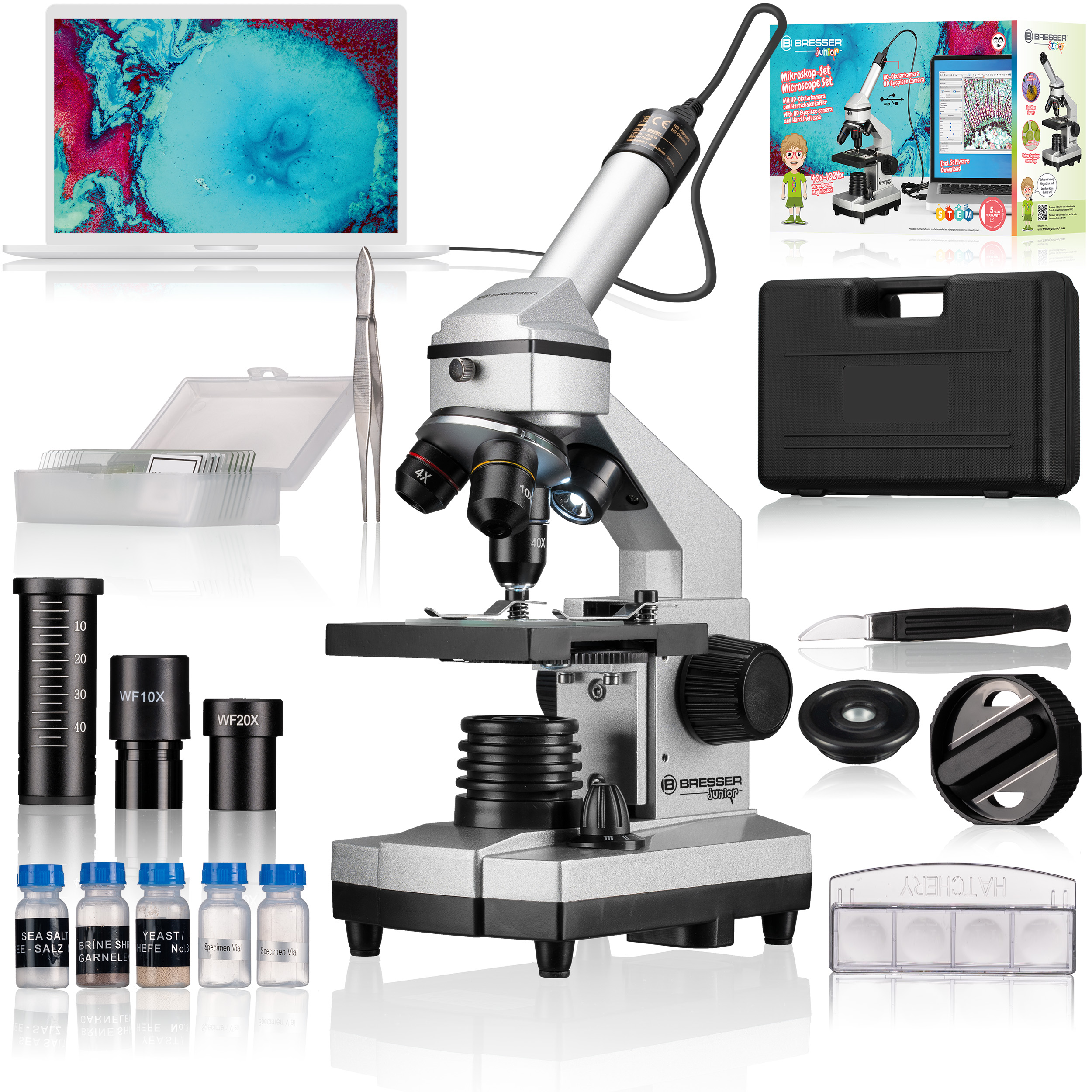 Microscopio y accesorios. Incluye computadora portátil, portaobjetos, viales y una caja de herramientas. Fondo blanco.