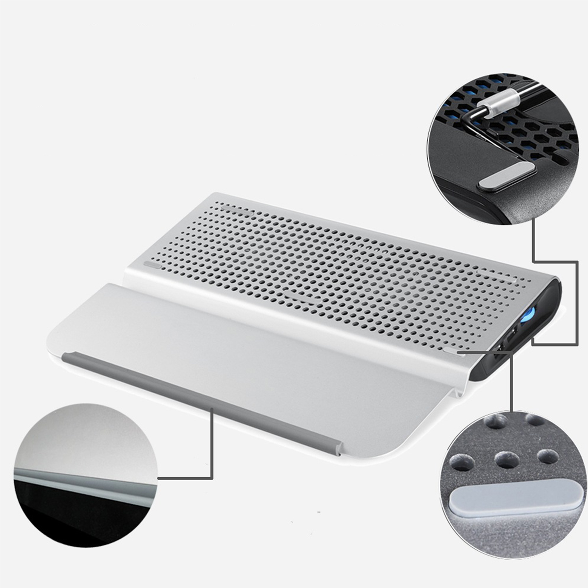 Silberner Laptop-Kühler mit Diagrammen, die Belüftungslöcher und Gummipads hervorheben.