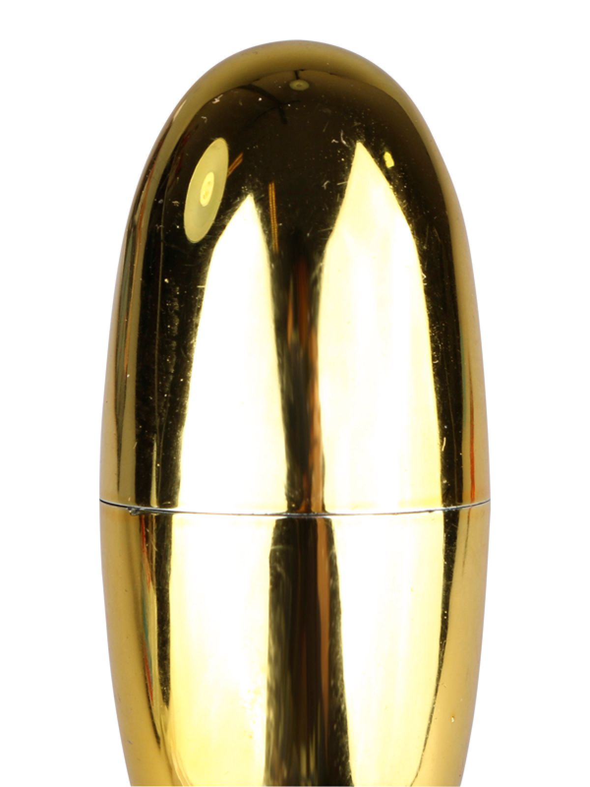 Ein goldener, kugelförmiger Kosmetikbehälter, der Licht reflektiert.