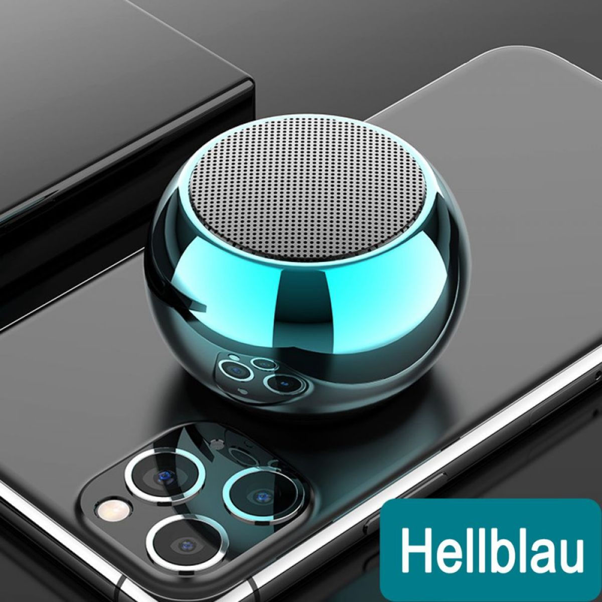 Blauer metallischer runder Lautsprecher auf einem schwarzen Telefon. Das Wort 'Hellblau' steht unter dem Lautsprecher.