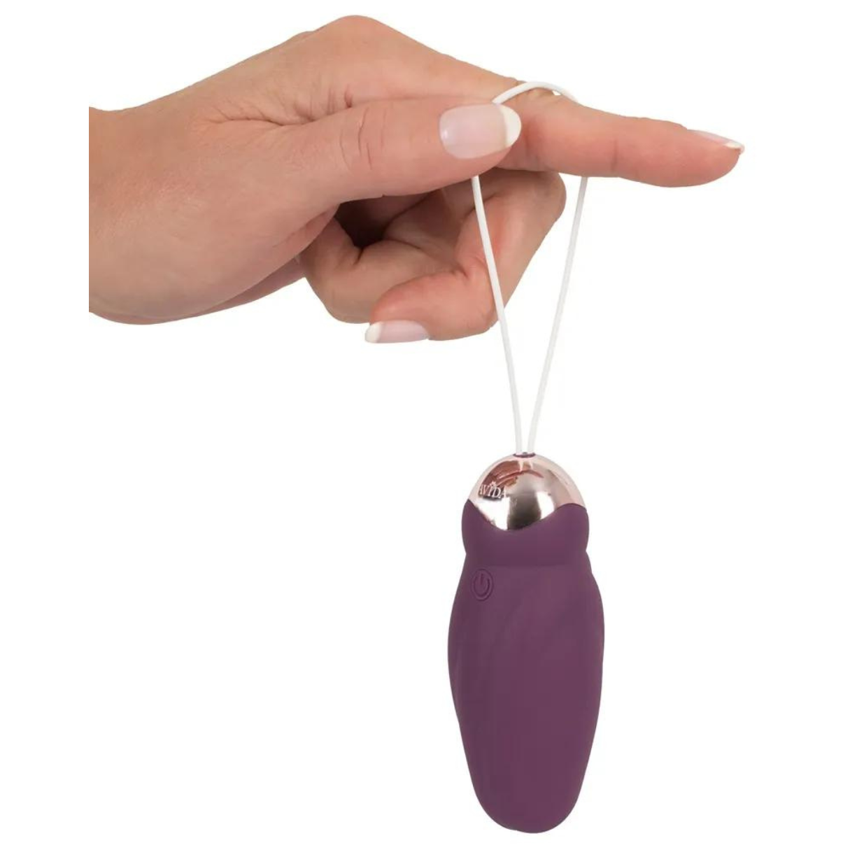 Eine Hand, die einen violetten Vibrator hält, mit einer weißen Schnur um einen Finger.