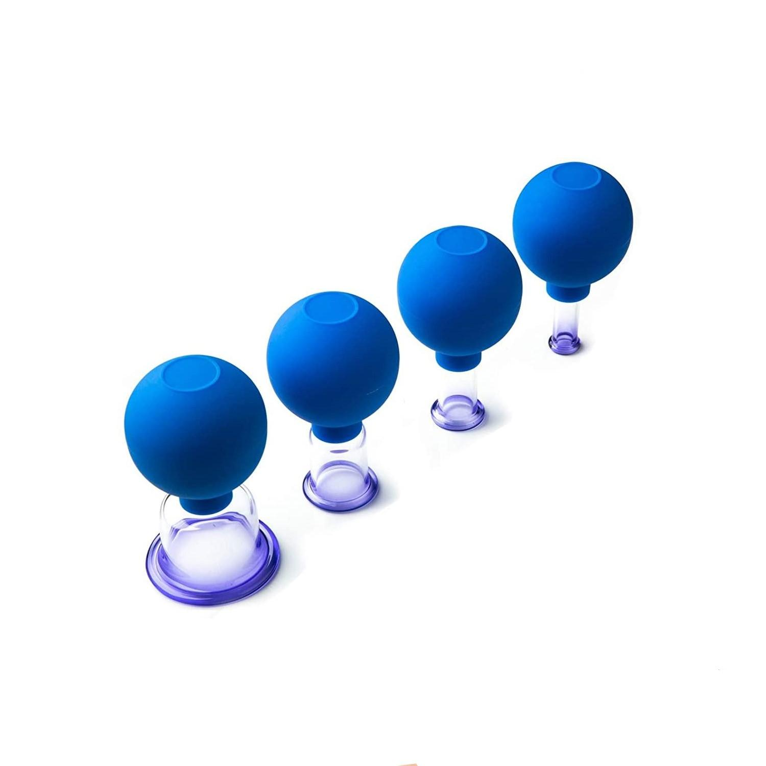 Quattro coppette blu per coppettazione. Sono sferiche con basi trasparenti.