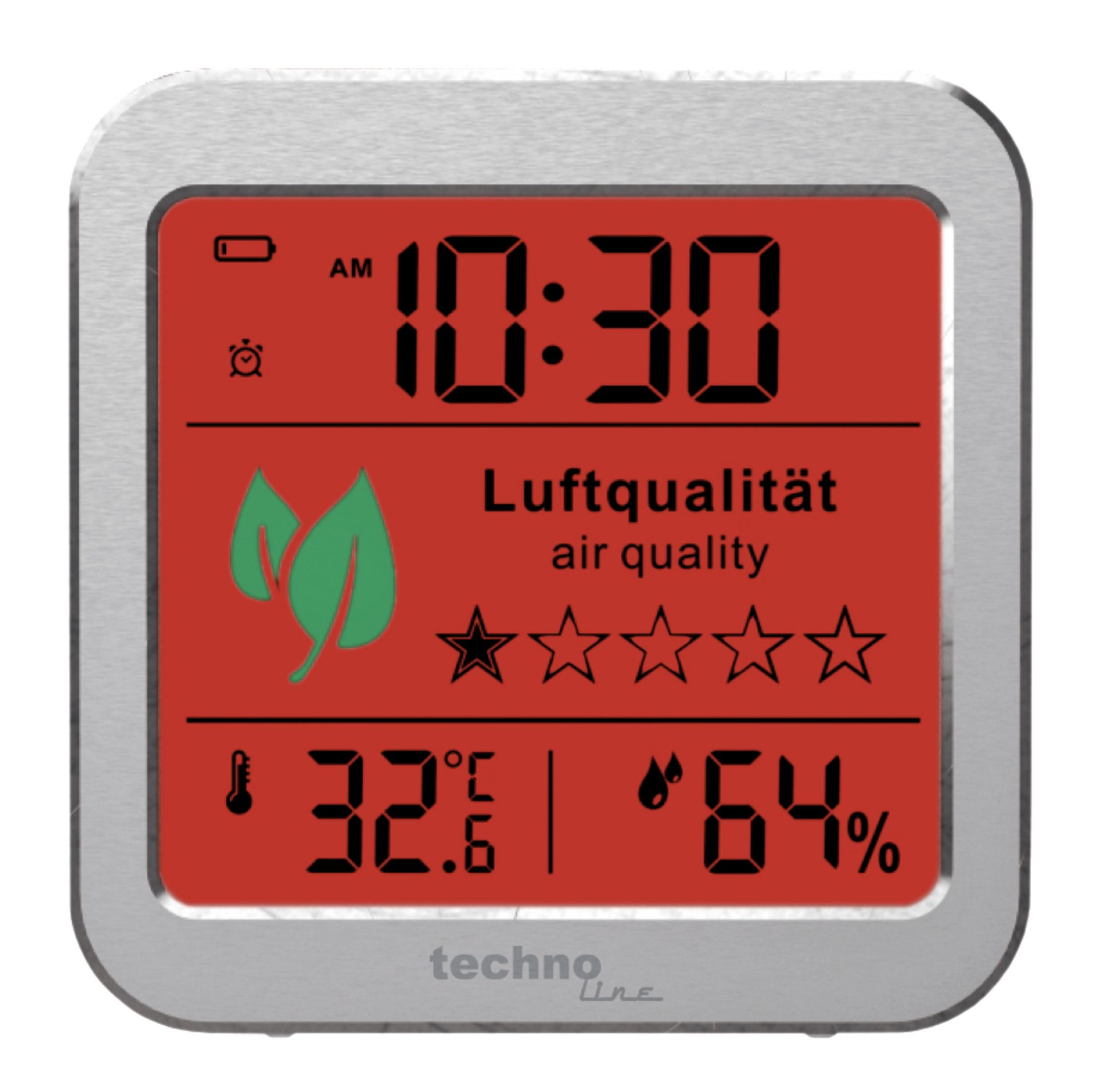 Wyświetlacz cyfrowy z czasem, jakością powietrza i temperaturą, z czerwonym tłem w srebrnej ramce.