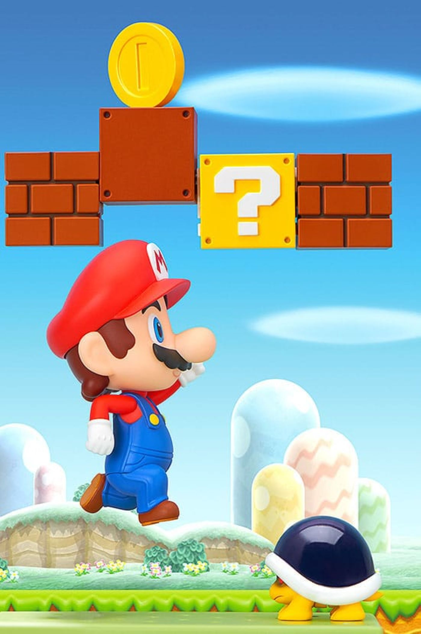 Mario-Figur springt, mit Fragezeichen-Block, Münze und Koopa Troopa in Super Mario Szene.