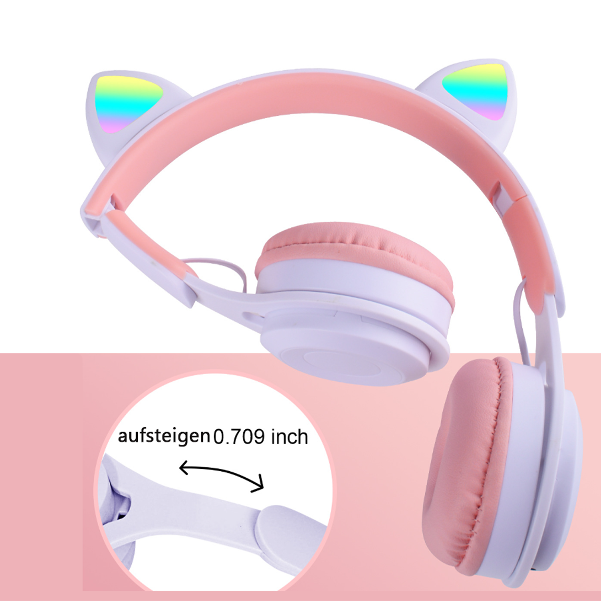Rosa-weiße Katzenohrkopfhörer mit Regenbogenakzenten, schräge Ansicht, rosa Hintergrund.
