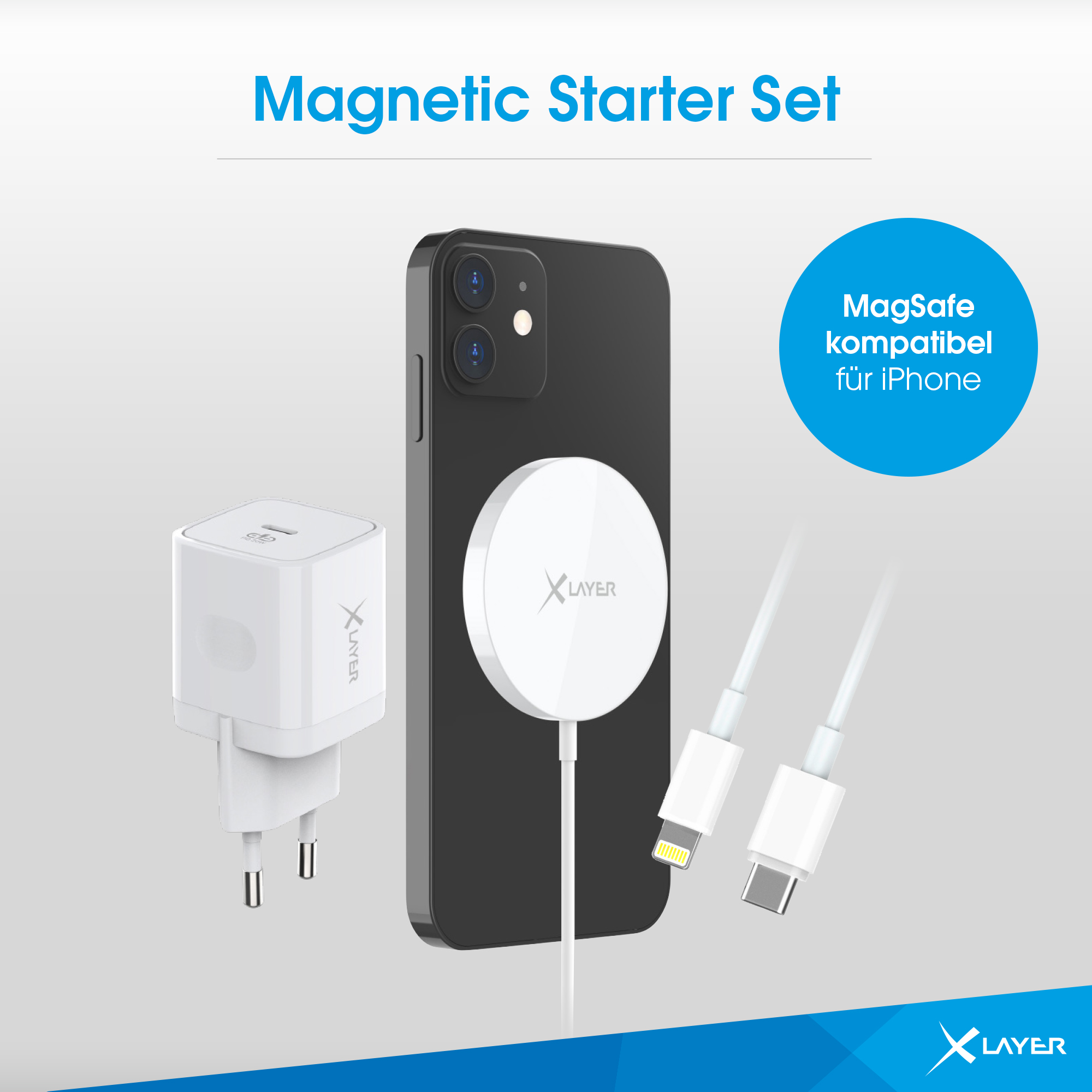 Ein magnetisches Starter-Set mit weißem Ladegerät, schwarzem Telefon und Kabeln.