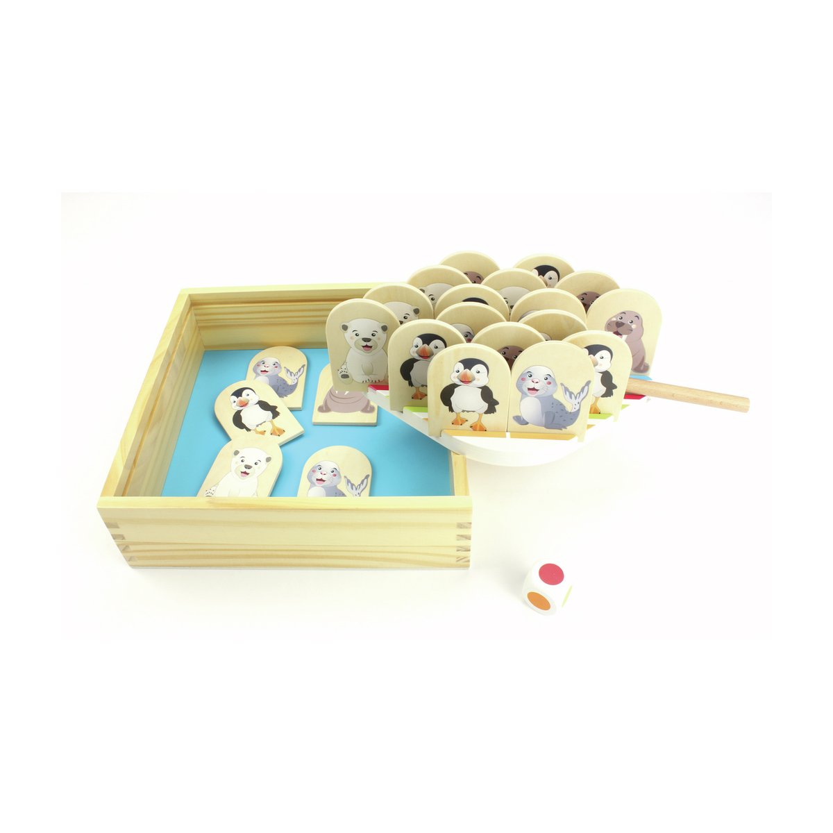 Juego de mesa de madera con piezas de pingüinos y osos polares, con un dado y una bandeja.