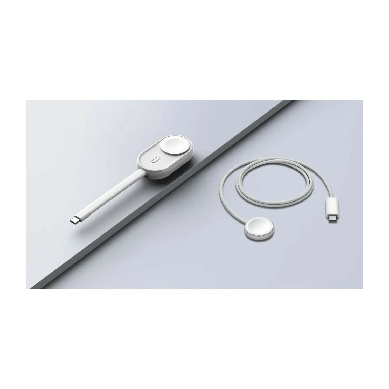 Weißes Ladegerät mit USB-C-Kabel und zwei Ladepads auf grauer Oberfläche.