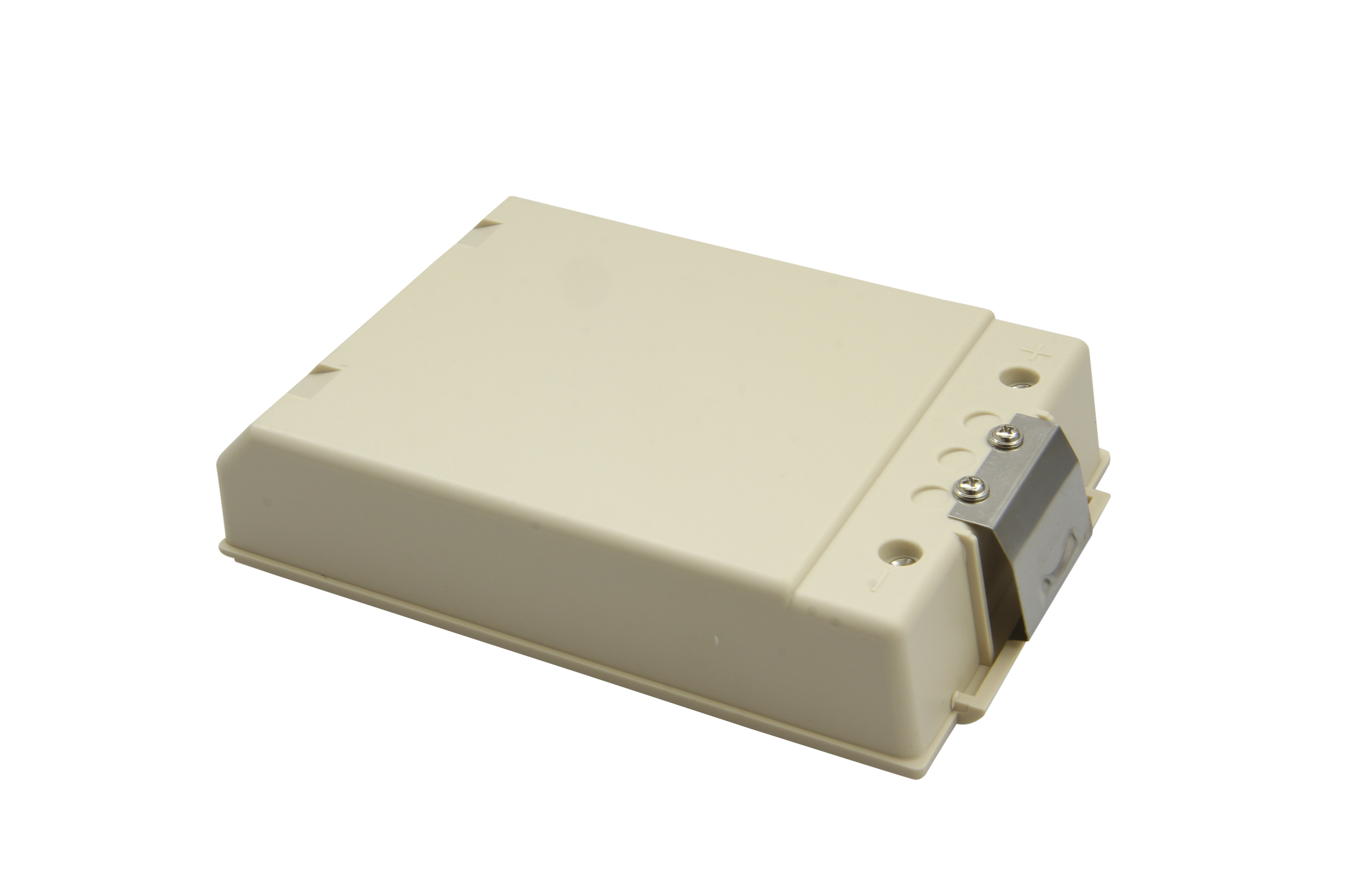 Ein beiges rechteckiges elektronisches Gerät mit einem Metallclip oben.