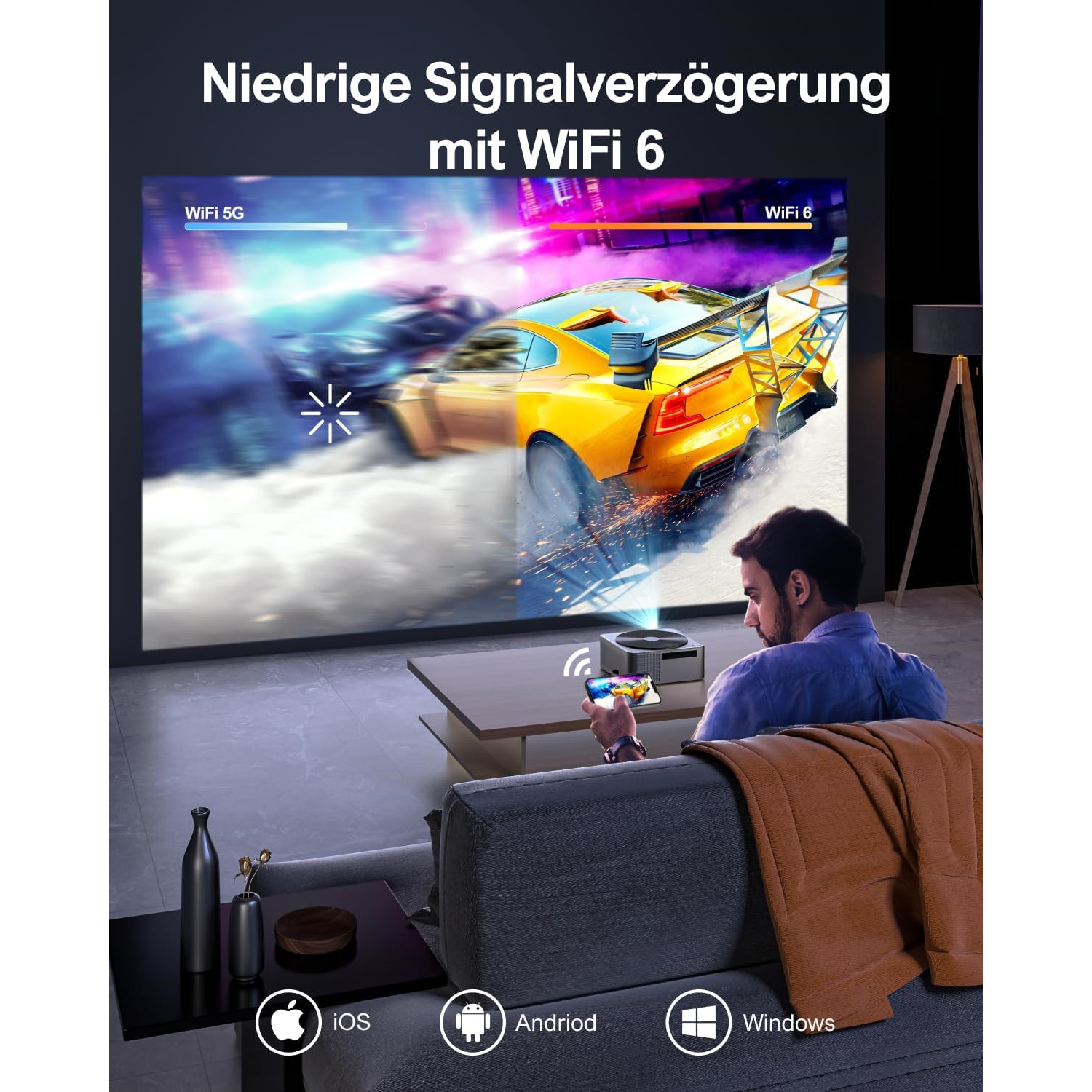 Eine Person steuert einen Projektor, der ein Autorennen-Spiel zeigt.