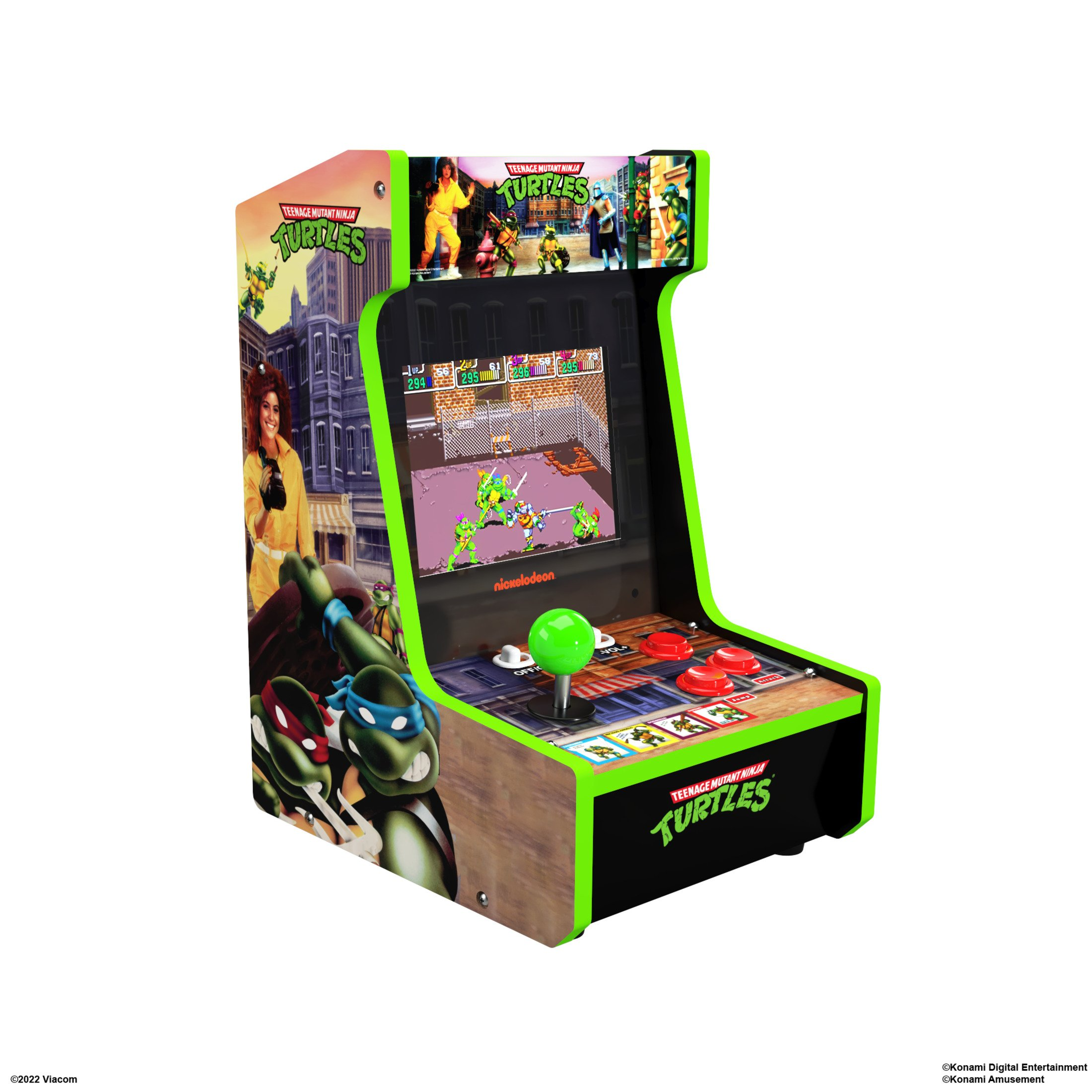 Máquina arcade con gráficos de las Tortugas Ninja, con un joystick verde y botones rojos.