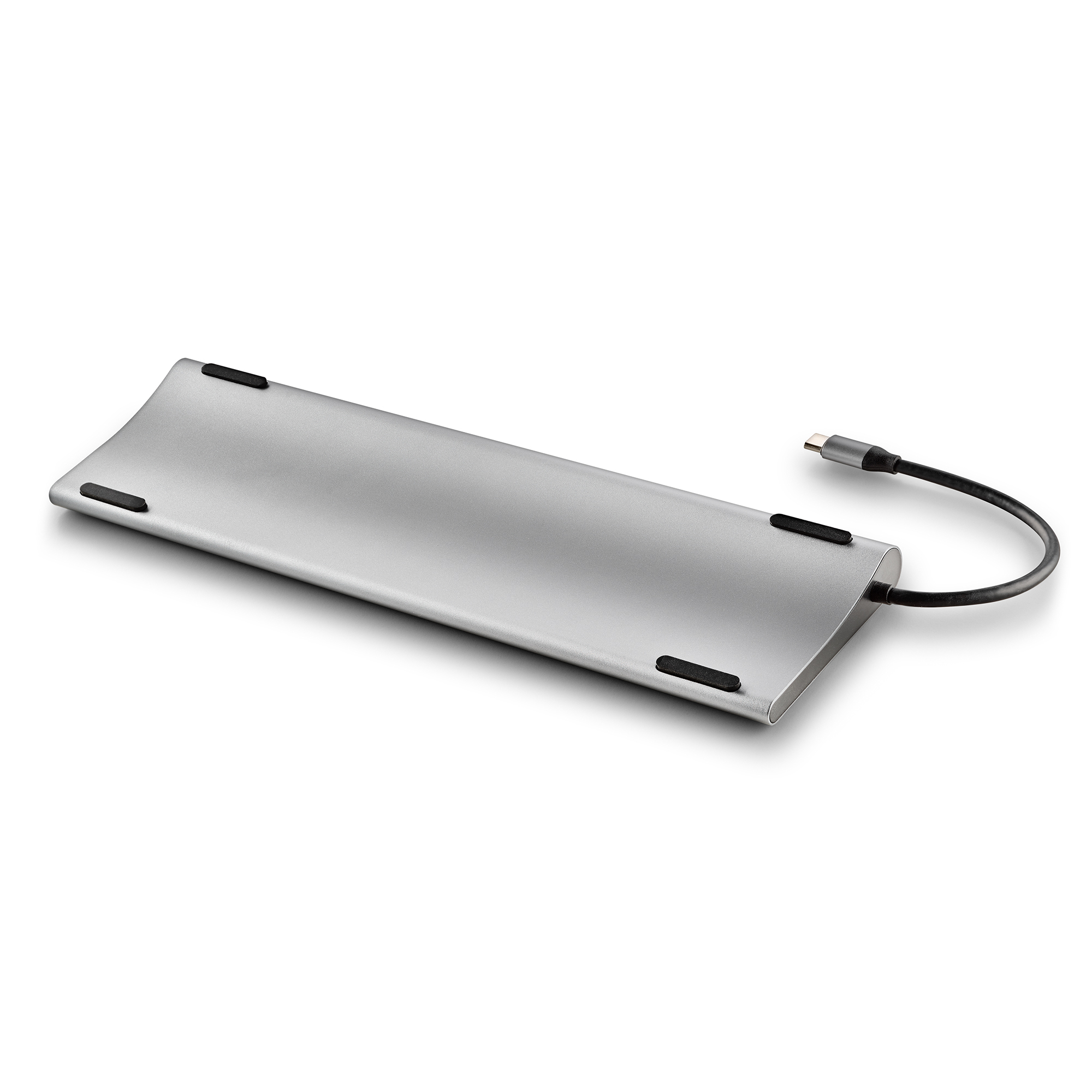 Silberner Hub mit einem USB-C-Kabel und schwarzen Pads. Der Hub befindet sich auf einer weißen Oberfläche.