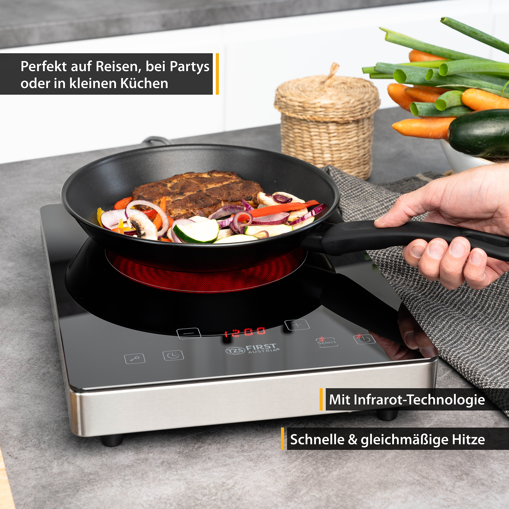 Elektrischer Herd mit einer Pfanne Essen. Text: Infrarot-Technologie, schnelle und gleichmäßige Wärme. Essen wird gekocht.