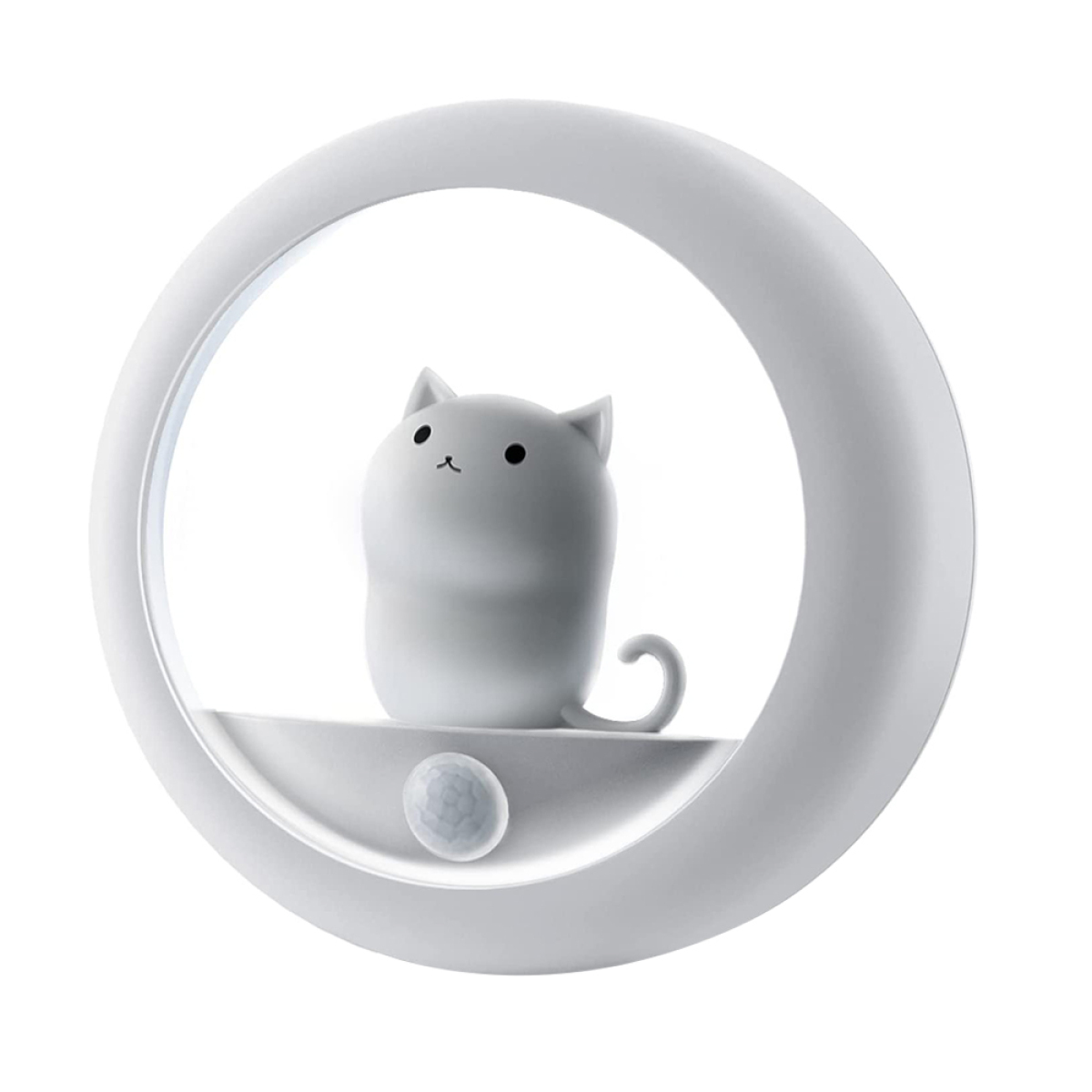 Ein weißes katzenförmiges Nachtlicht in einem weißen kreisförmigen Rahmen mit Sensor.