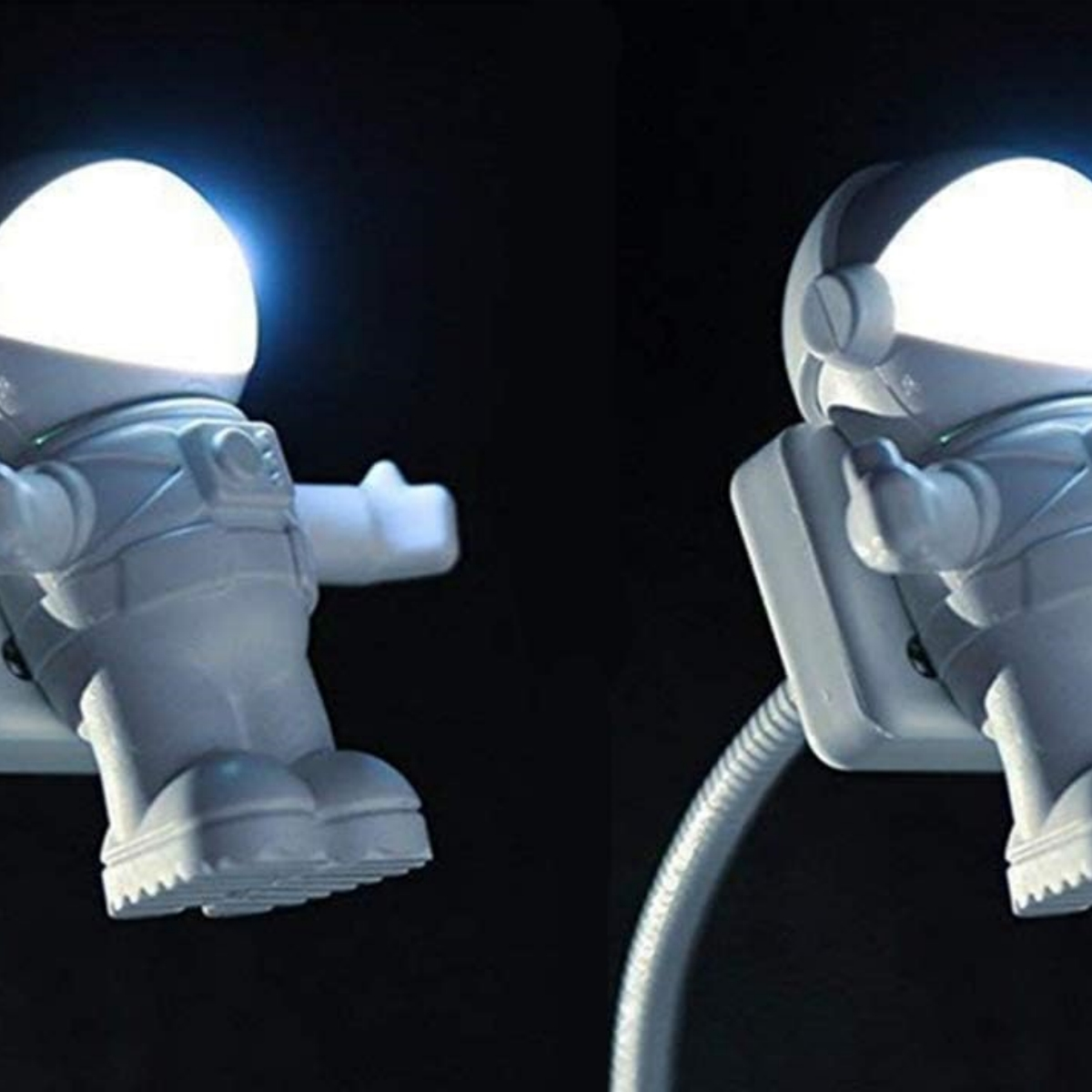Zwei weiße Astronautenlampen. Ein Arm erhoben. Dunkler Hintergrund.