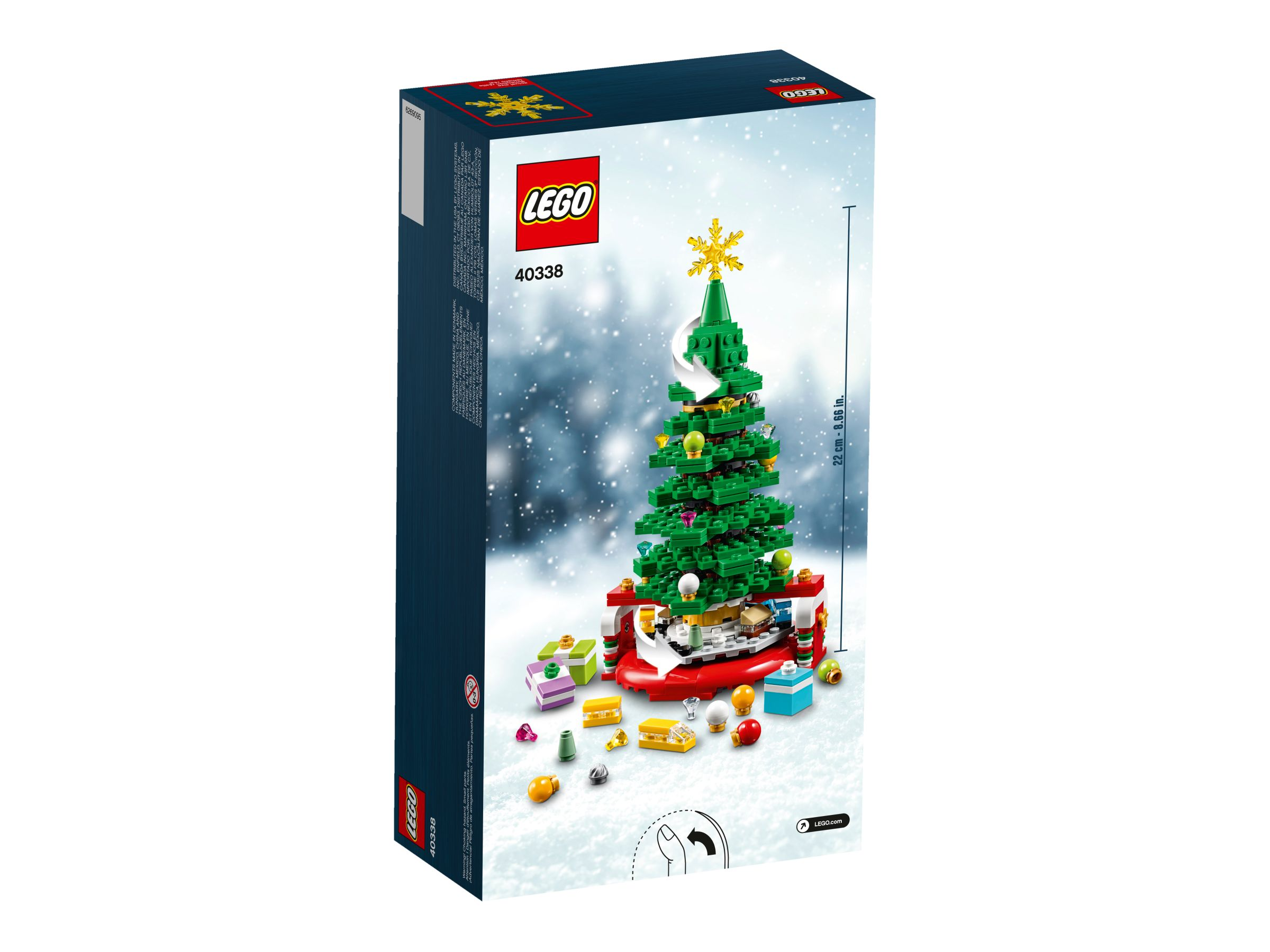 Rückseite der Lego-Weihnachtsbaumbox. Weihnachtsbaummodell mit Dekorationen und Geschenken auf Schnee.