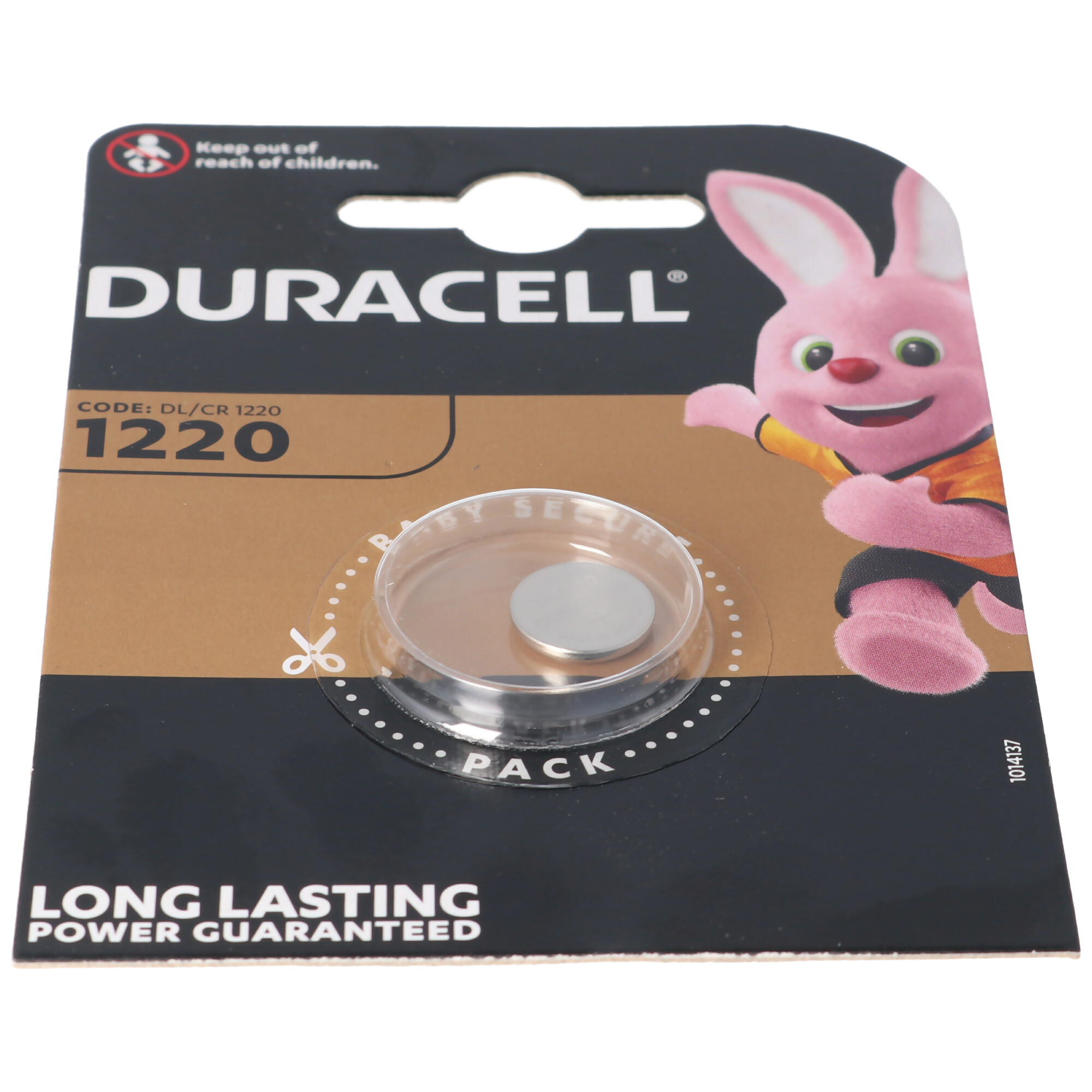Eine Duracell 1220 Batteriepackung, mit einem rosa Hasen, und eine klare Batterie in einem Halter auf braunem Hintergrund.