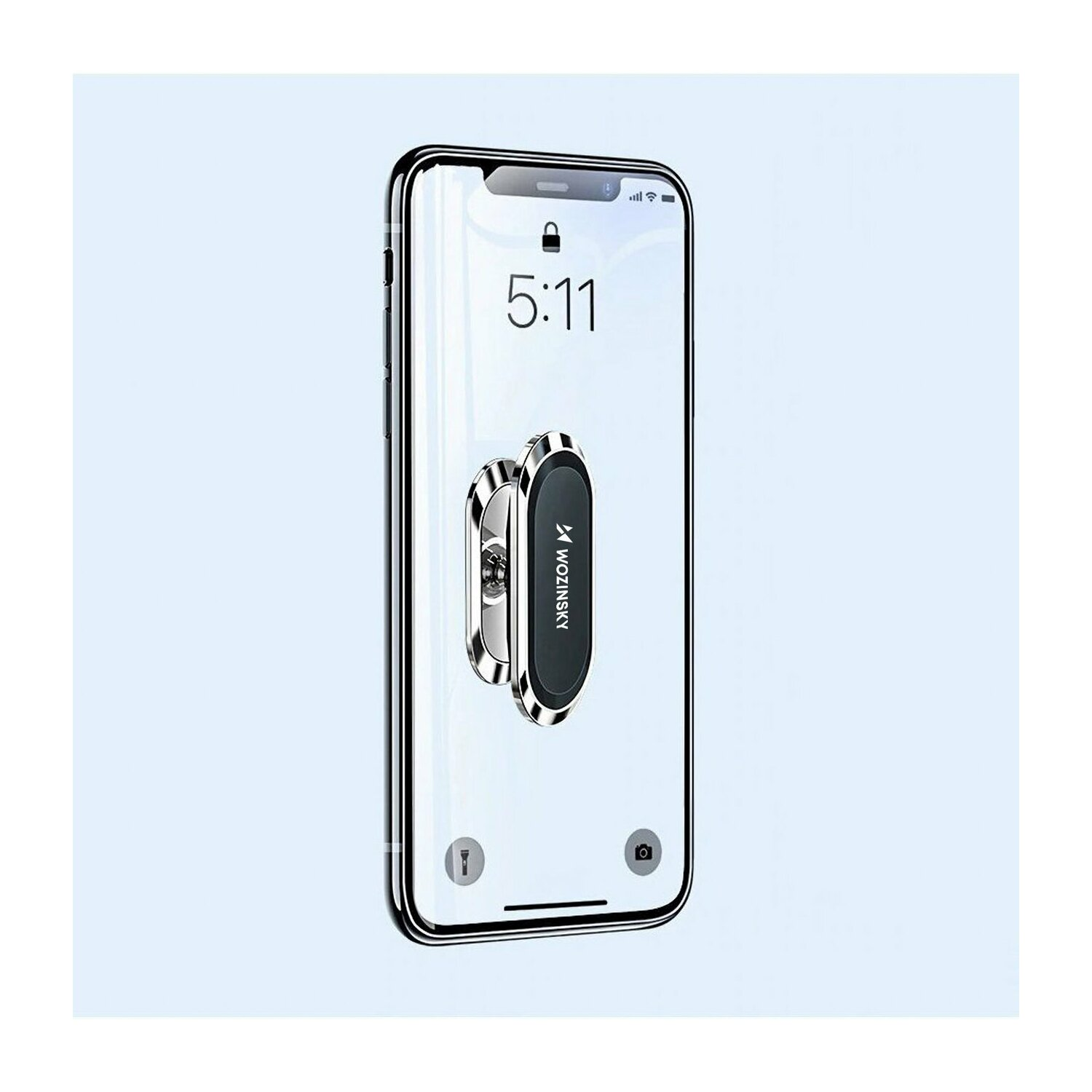 Smartfon z dołączonym uchwytem na telefon. Na ekranie godzina 5:11.