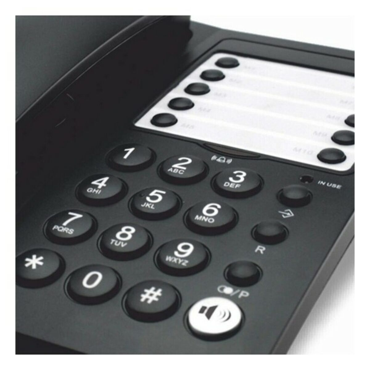 Ein schwarzes Festnetztelefon mit einem Ziffernblock und mehreren Tasten mit Zahlen und Symbolen.