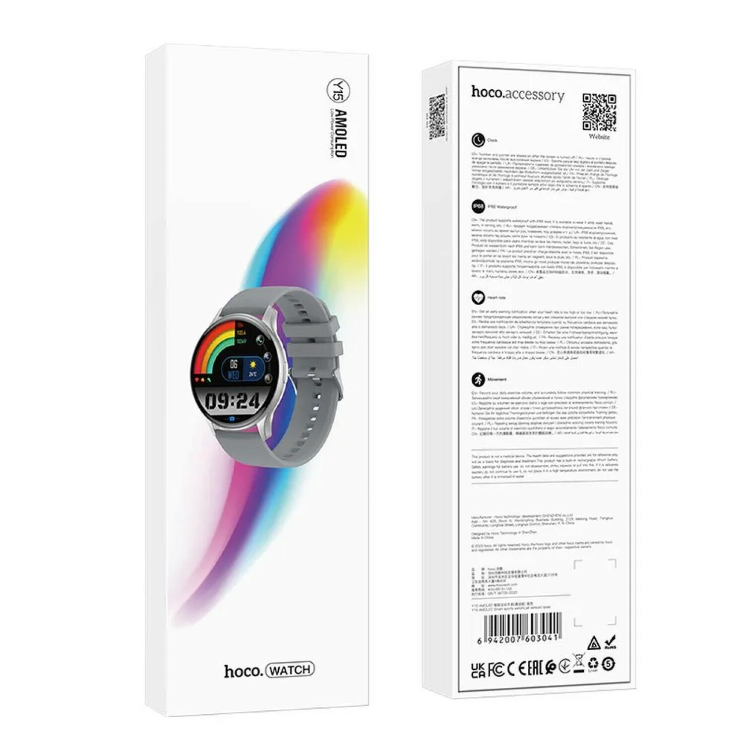 Orologio e la sua scatola. L'orologio è grigio con quadrante colorato. La scatola ha testo.