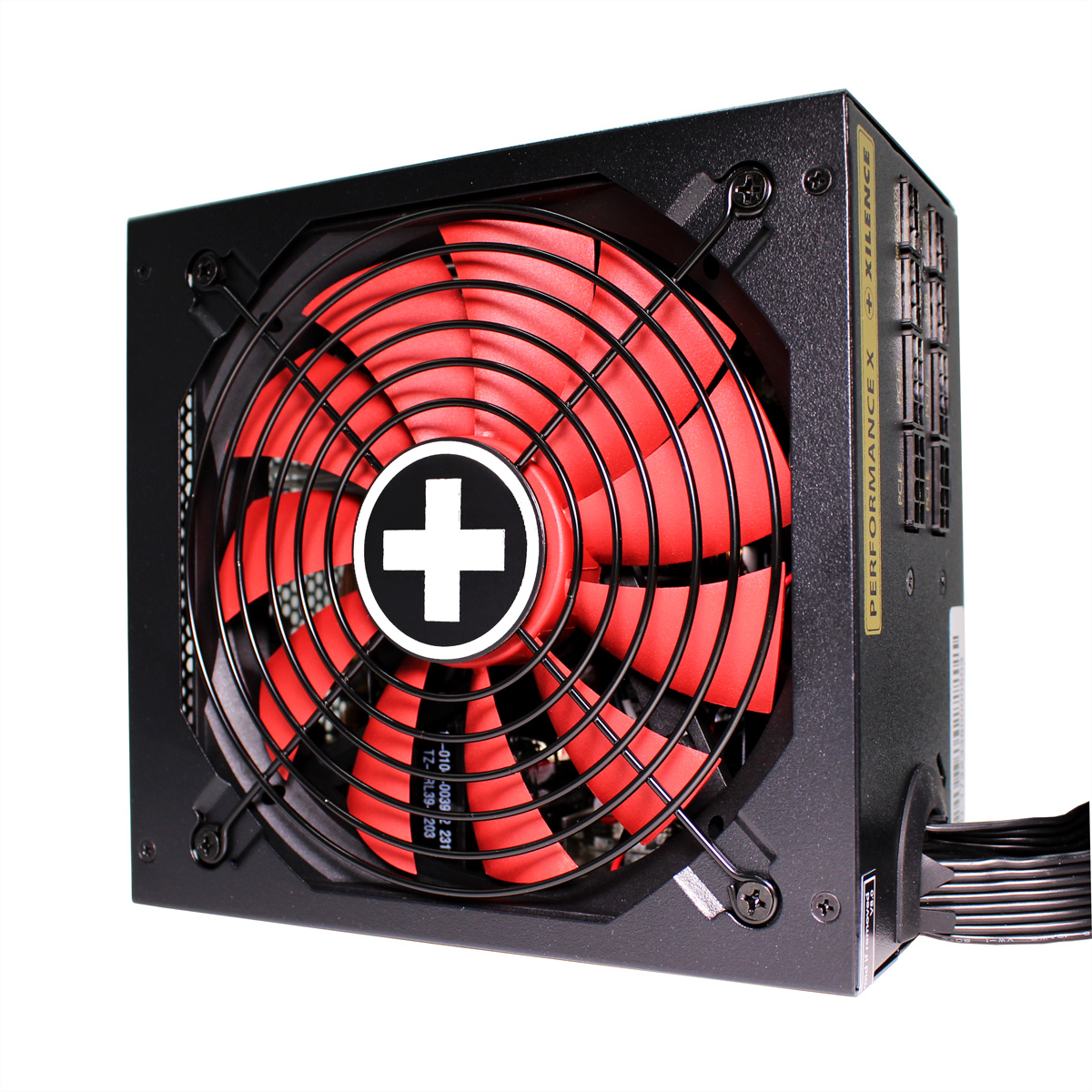 Czarny zasilacz komputera z czerwonym wentylatorem i białym logo krzyża.