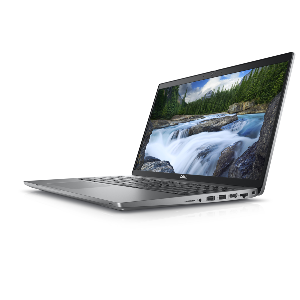 A silver laptop, open, on a white surface. The screen shows a waterfall.