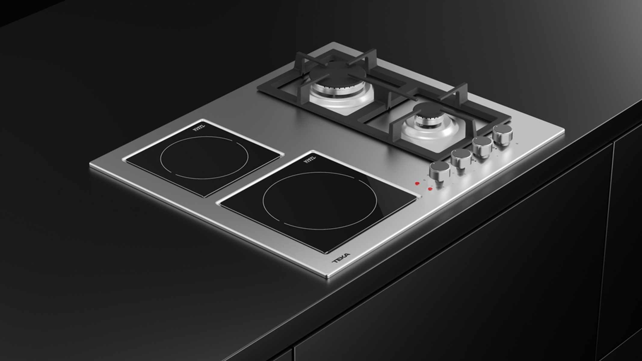 Un piano di lavoro della cucina con un fornello in acciaio inossidabile con bruciatori a gas e piani cottura elettrici.