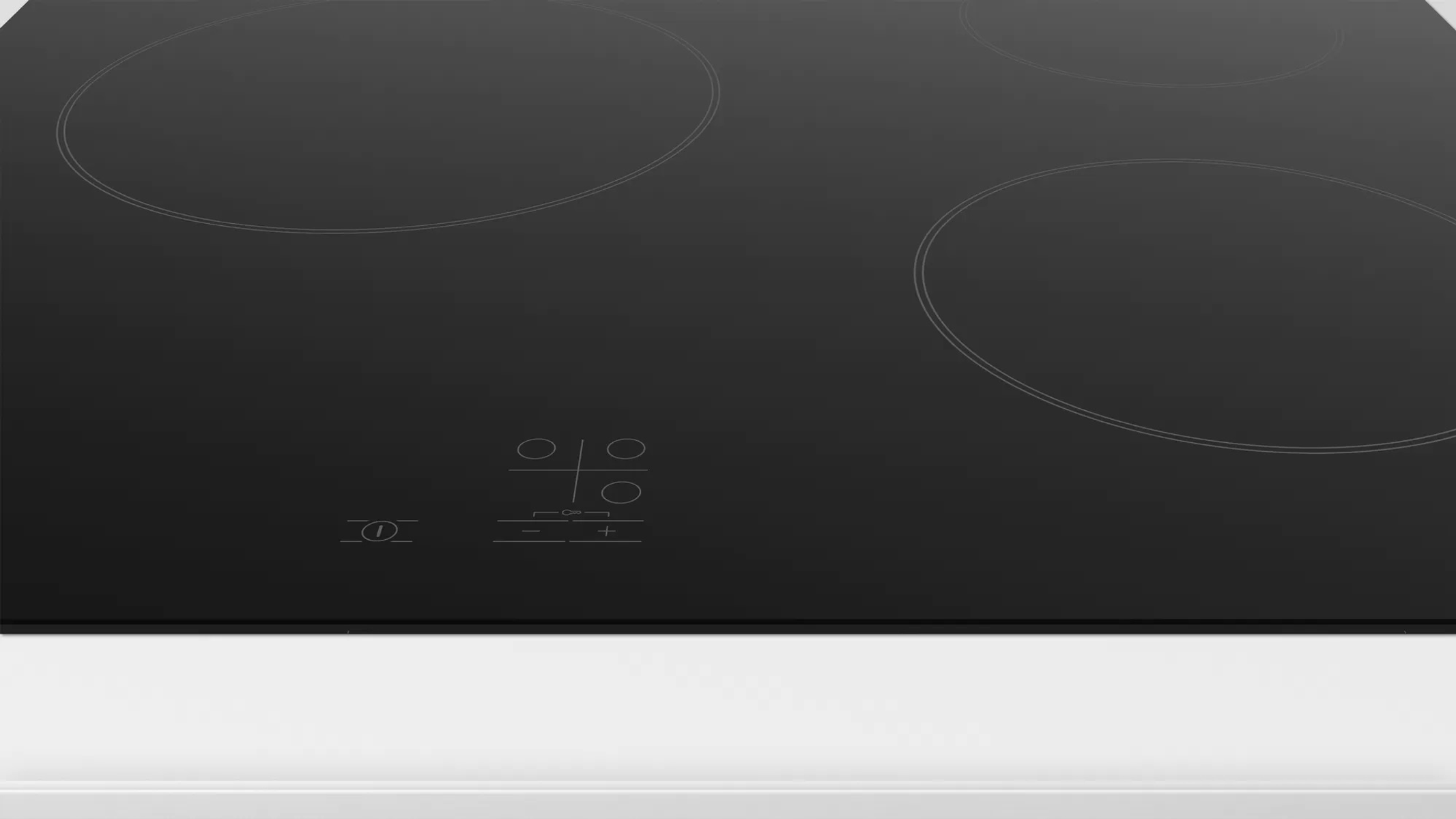 Placa de cocina de vidrio negro con cuatro quemadores y panel de control.