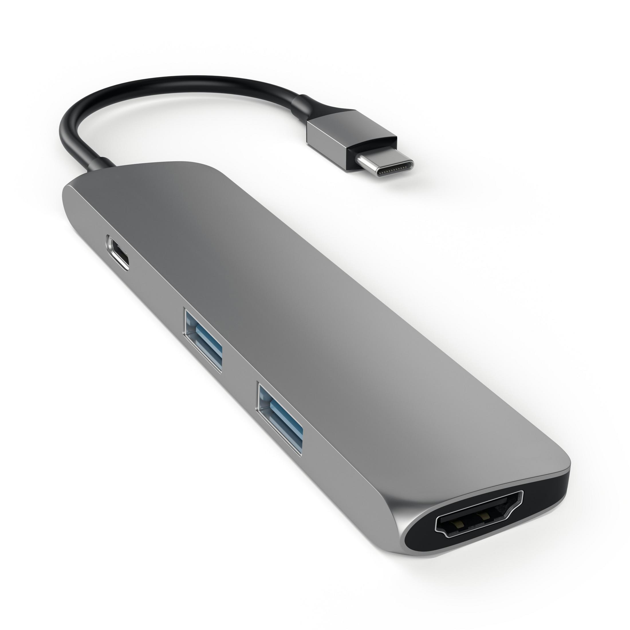 Concentrador USB-C plateado con puertos HDMI y USB, y cable negro. Aislado sobre fondo blanco.