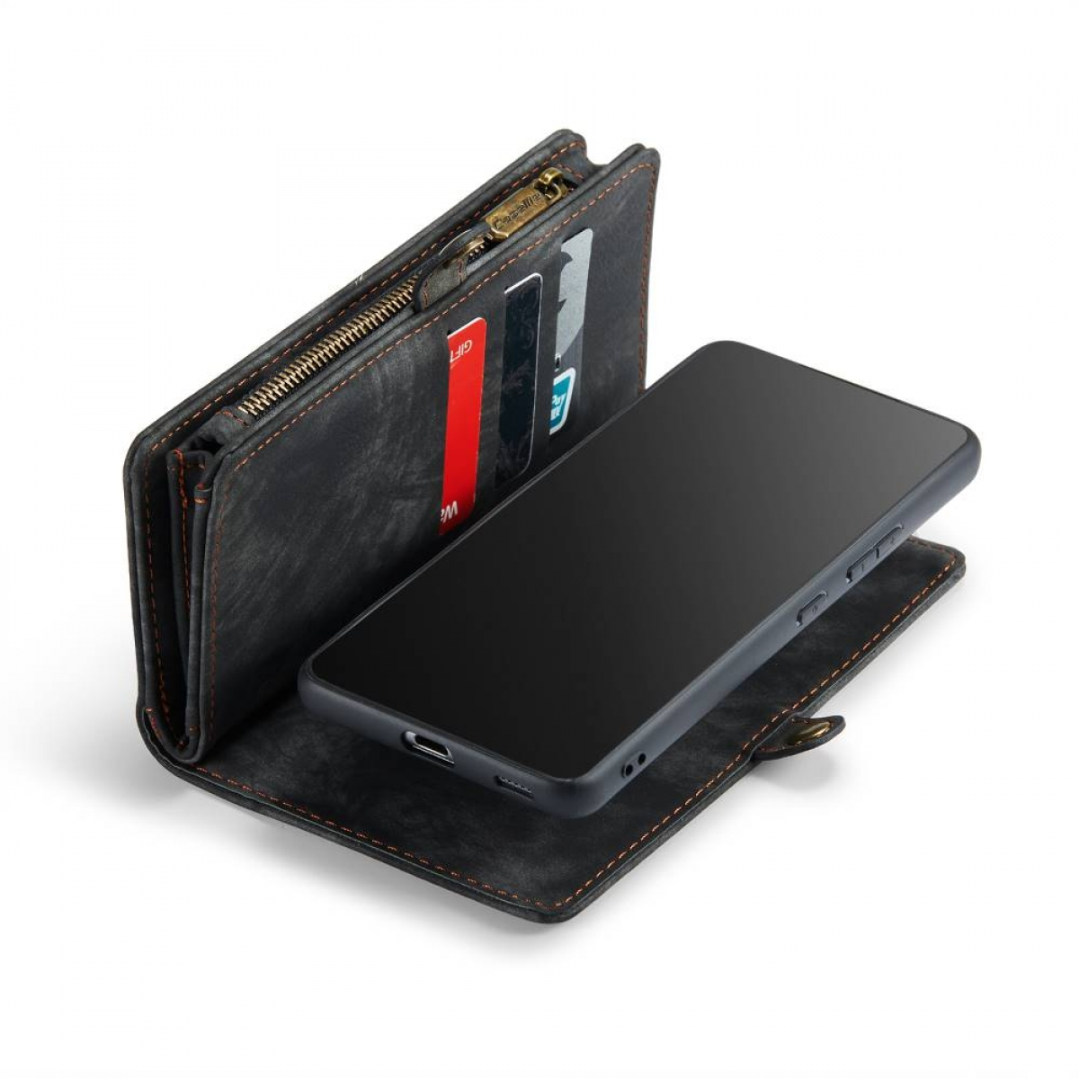 Eine schwarze Brieftasche und ein Telefon. Die Brieftasche ist offen, Karten sind sichtbar. Das Telefon liegt daneben.